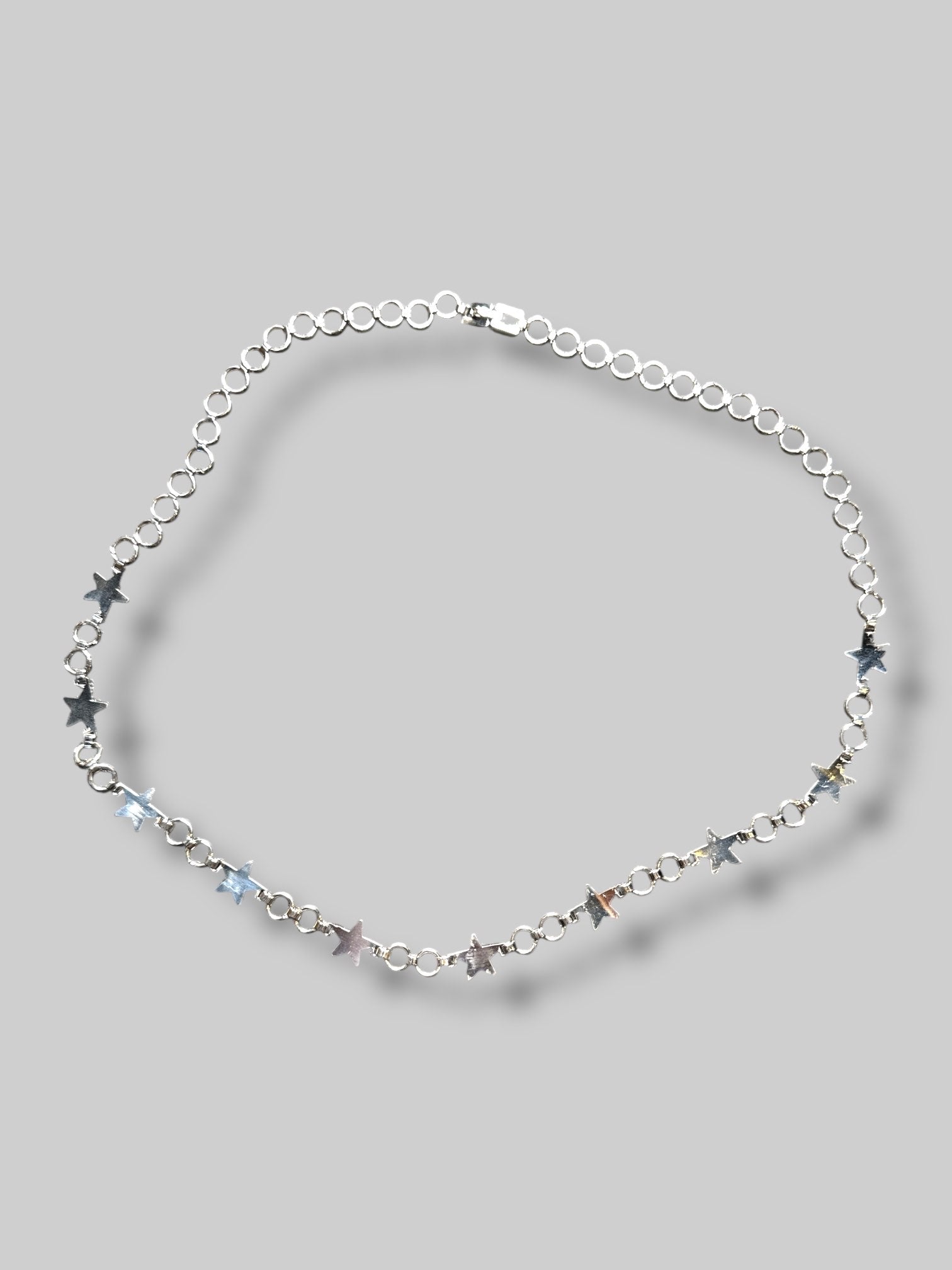 Silver tone star necklace