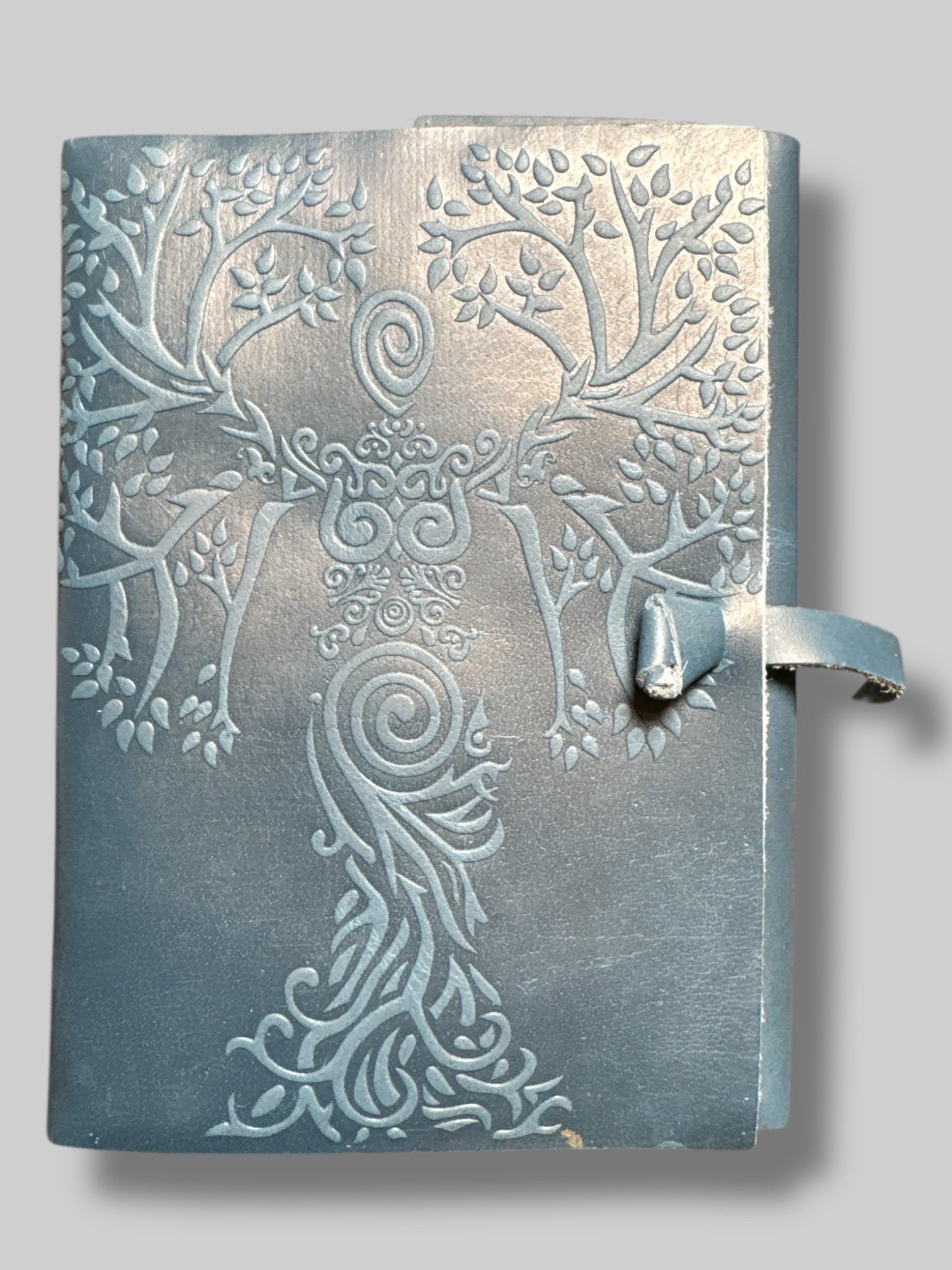 7” by 4.5”  blue leather bound tie journal with owl embossing