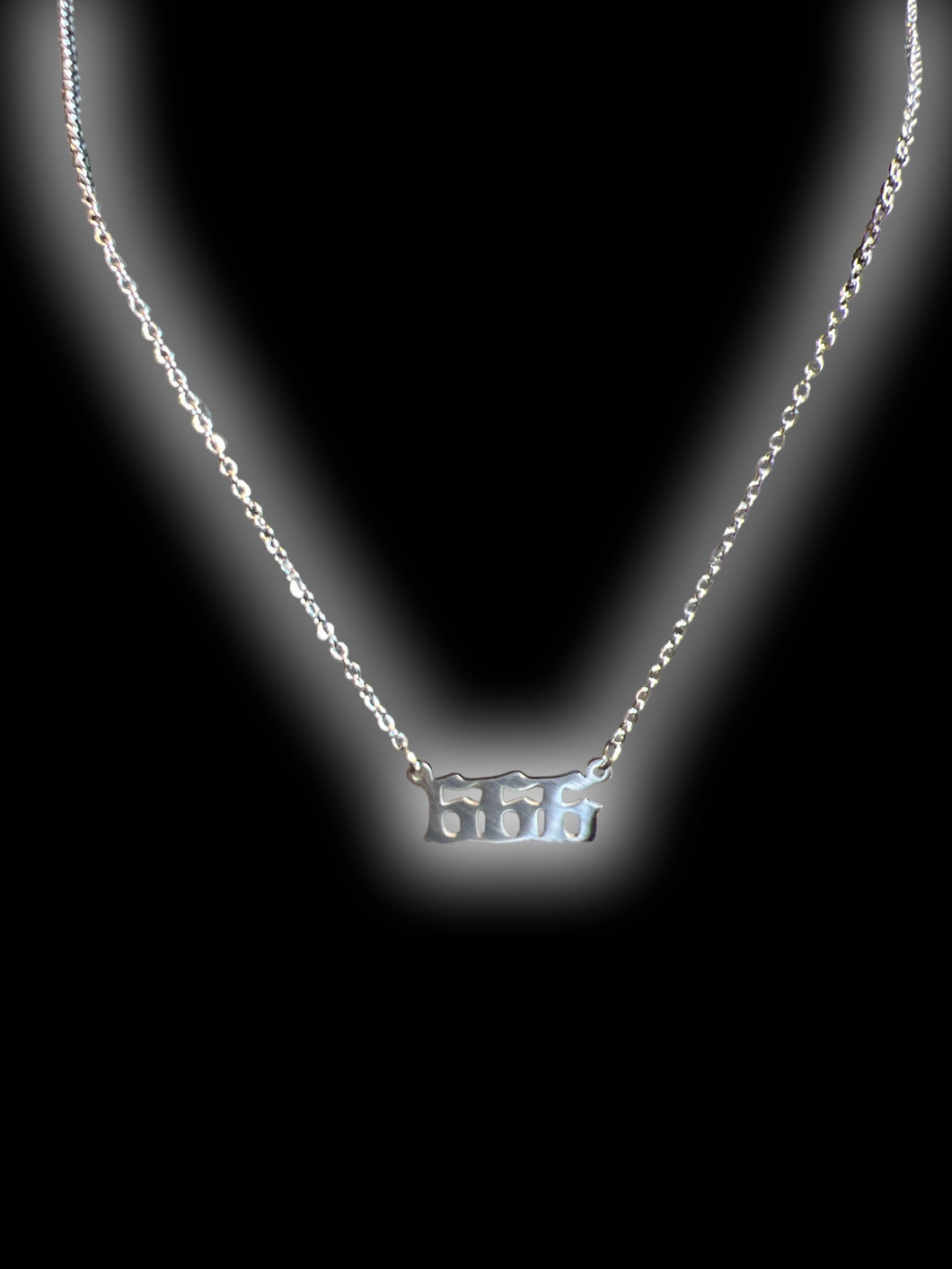 Silver-like angel number necklace “666”