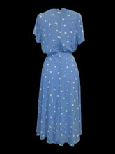 Load image into Gallery viewer, L Periwinkle, white, &amp; black floral pattern butterfly sleeve v-neckline button down maxi dress w/ cloth belt, &amp; clasp/zipper closure
