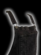 Load image into Gallery viewer, L Black denim taper leg overalls w/ adjustable straps, side button closures, &amp; pockets
