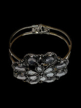 Load image into Gallery viewer, Silver-like hinge closure cuff bracelet w/ multiple clear cut gem floral setting
