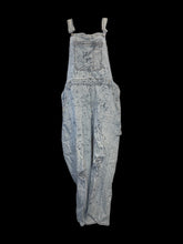 Load image into Gallery viewer, XL Light blue denim straight leg distressed overalls w/ splatter pattern, adjustable straps, pockets, &amp; two button side closure
