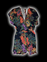Load image into Gallery viewer, M Black &amp; multicolor floral pattern short sleeve deep v-neckline romper w/ tie open back
