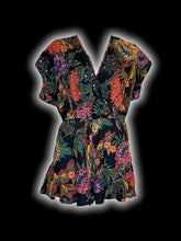 Load image into Gallery viewer, M Black &amp; multicolor floral pattern short sleeve deep v-neckline romper w/ tie open back
