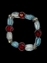 Load image into Gallery viewer, Blue, red, &amp; white beaded elastic bracelet w/ silver-like bar details
