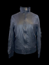 Load image into Gallery viewer, L Black leather zip-up jacket w/ blue, white, &amp; red cotton lining, zipper details, &amp; rib knit hems
