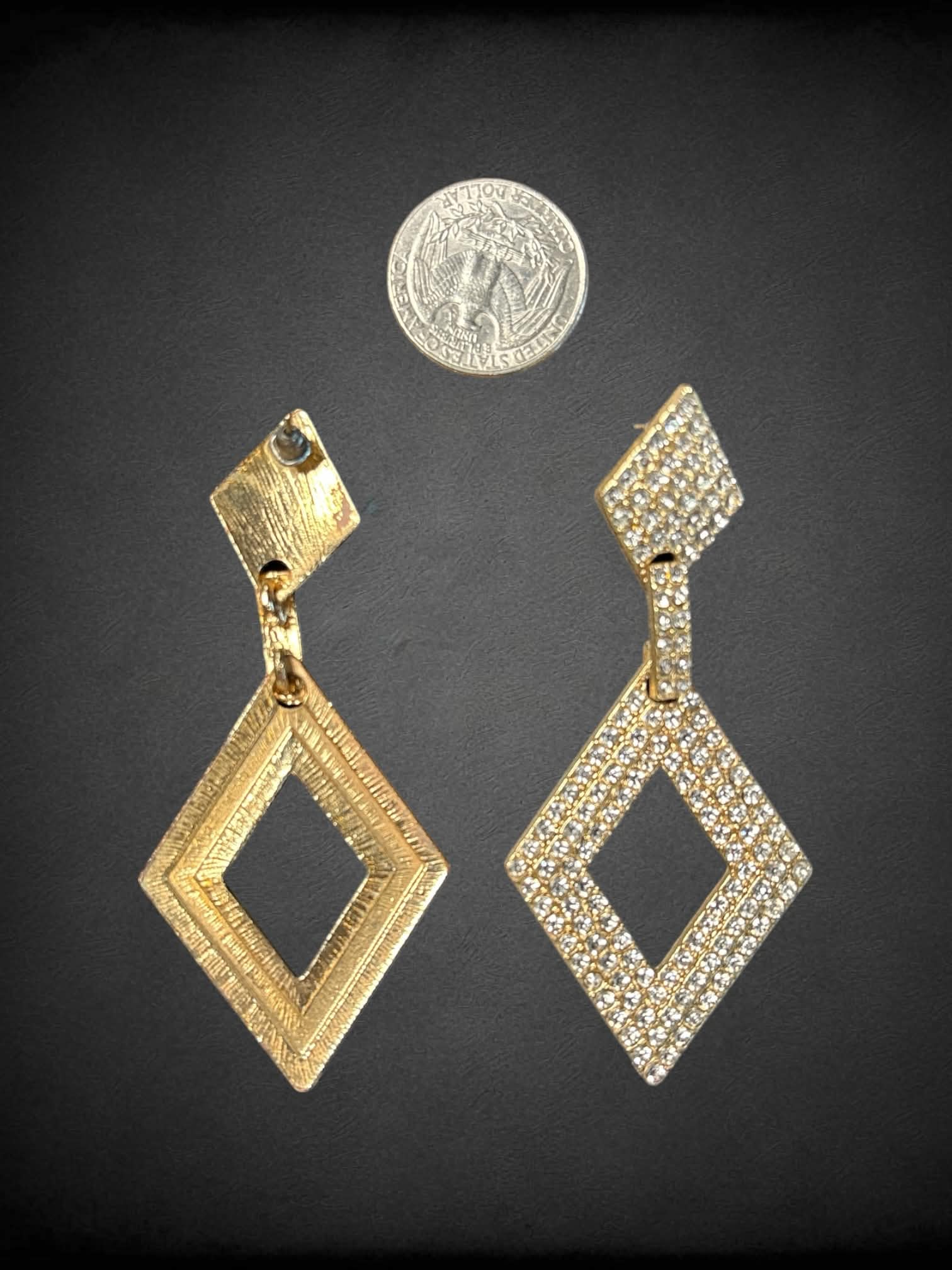 Gold toned diamond shape large dangle earrings with silver rhinestones