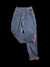 Load image into Gallery viewer, S Vintage 80s dark blue denim high waist taper leg pants w/ red, green, blue, &amp; yellow plaid lining, pockets, belt loops, &amp; button/zipper closure
