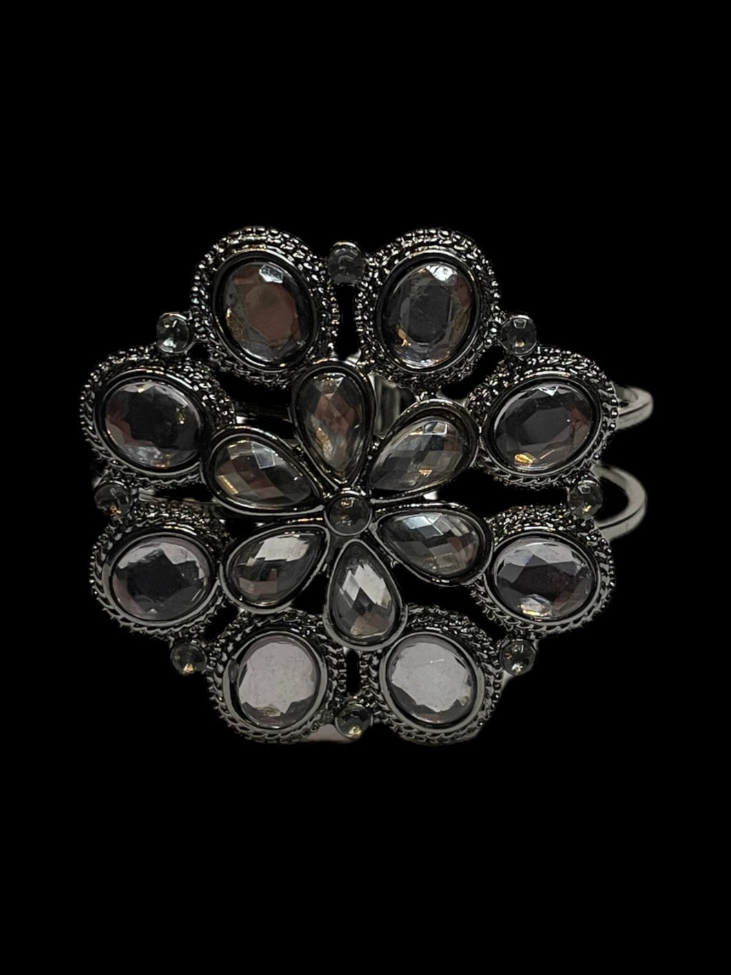 Silver-like hinge closure cuff bracelet w/ multiple clear cut gem floral setting