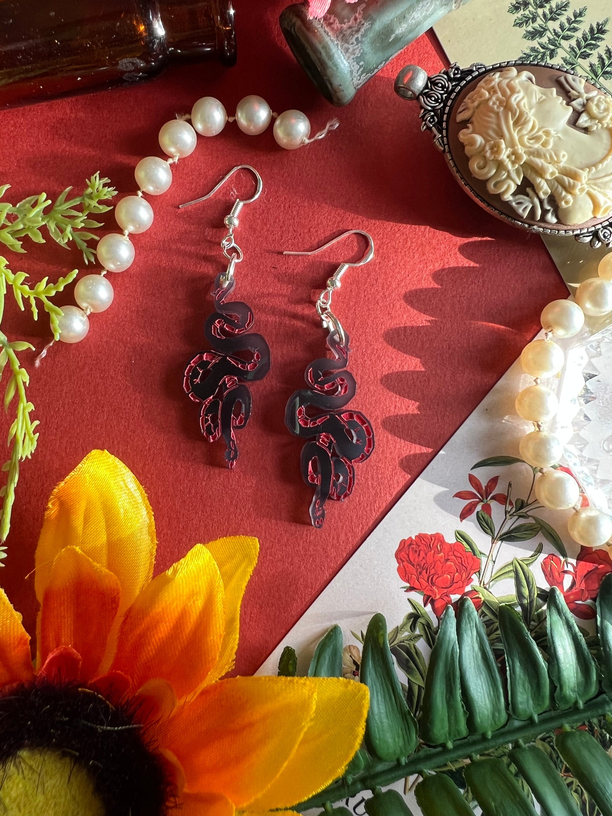 MINIS: Crowley’s Snake Tattoo