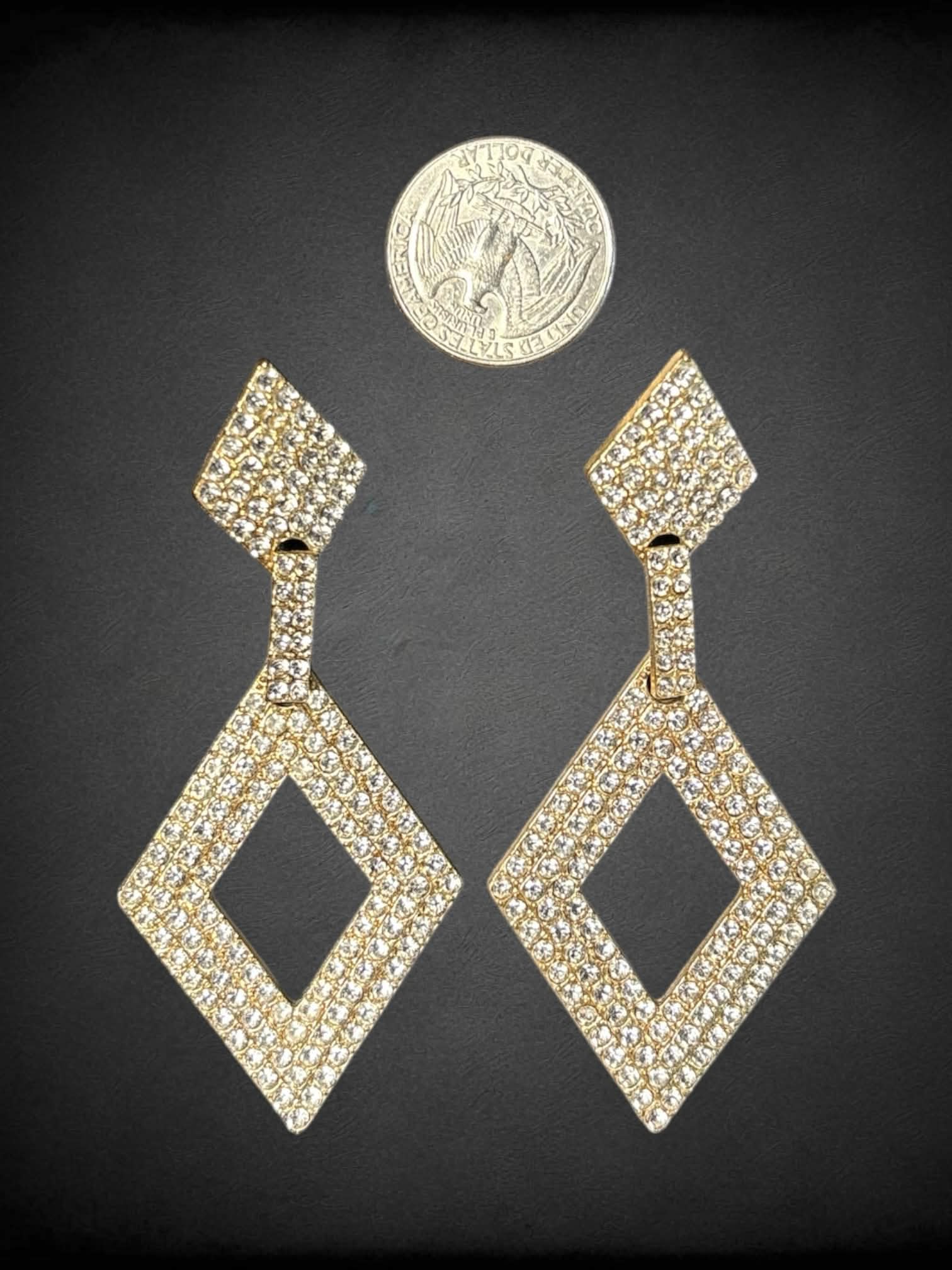 Gold toned diamond shape large dangle earrings with silver rhinestones