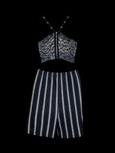 Load image into Gallery viewer, 0x Black sleevless sweetheart neckline romper w/ stylized white stripes, lace back, open back, &amp; back zipper closure
