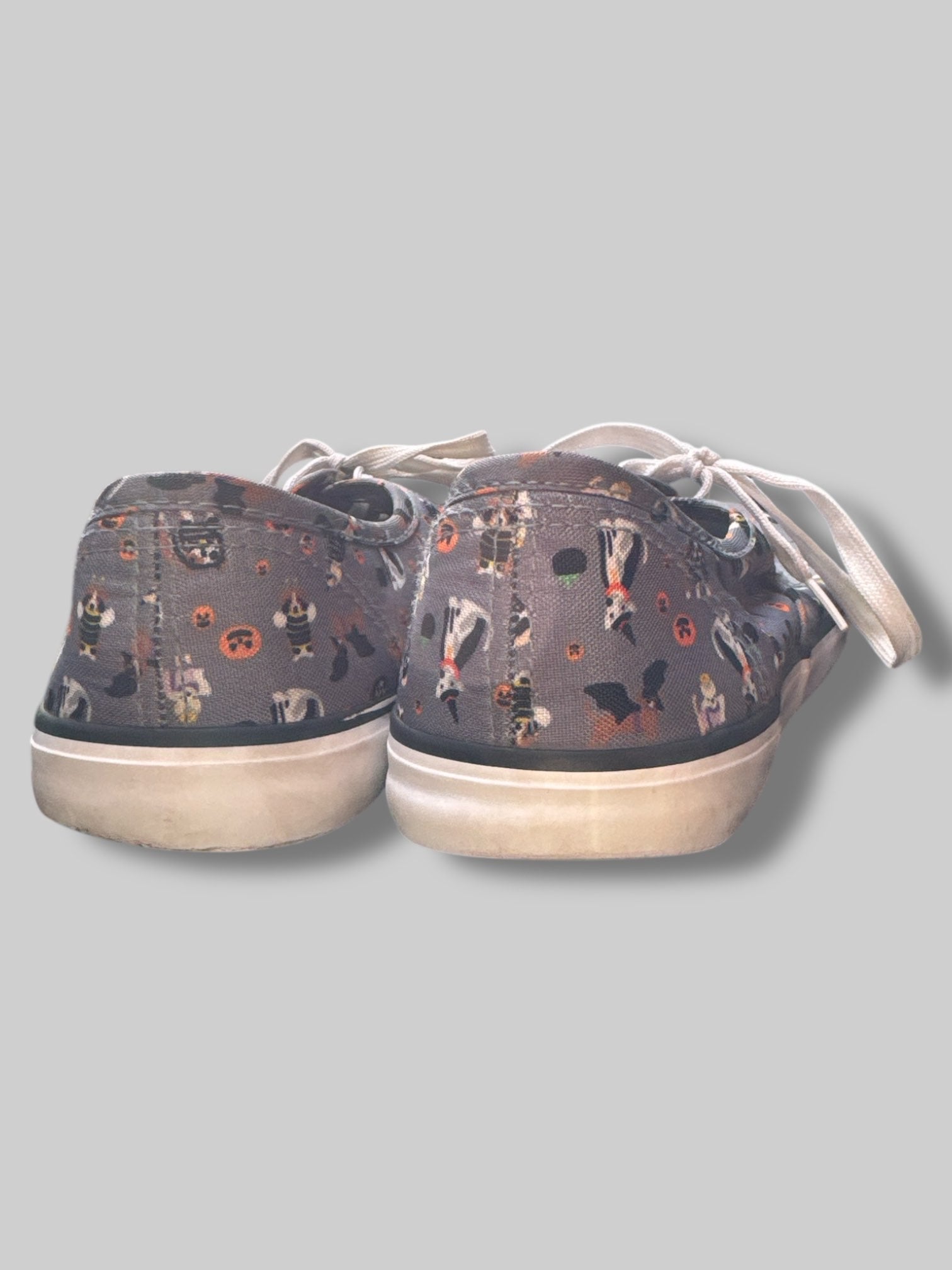 Size 8.5 grey sneakers with Halloween designs