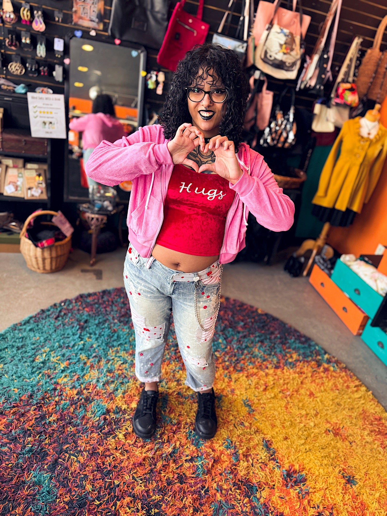 L Tender Secrets red crushed velvet tank top with white and silver glitter “Hugs”