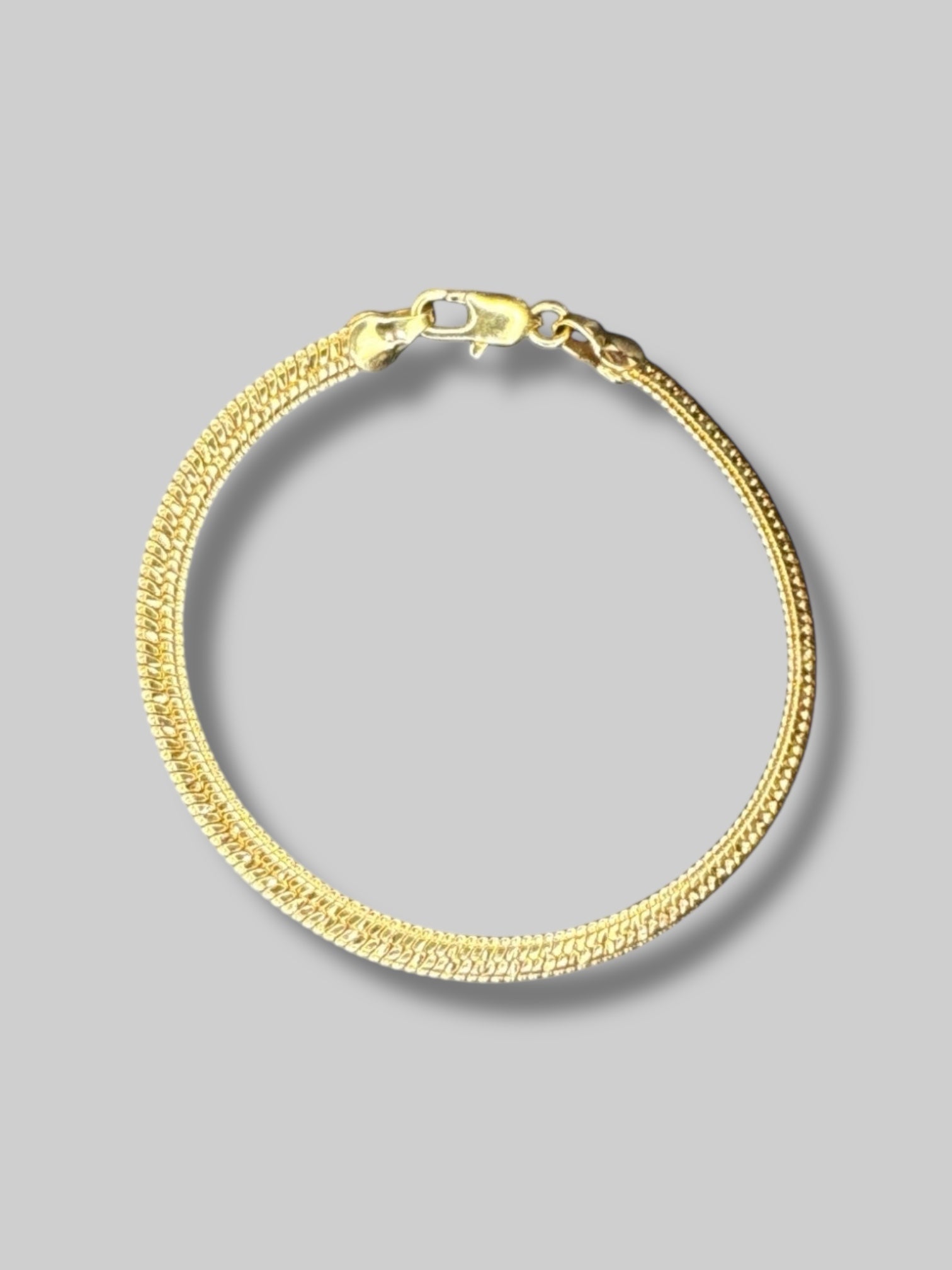 Vintage gold tone braided bracelet