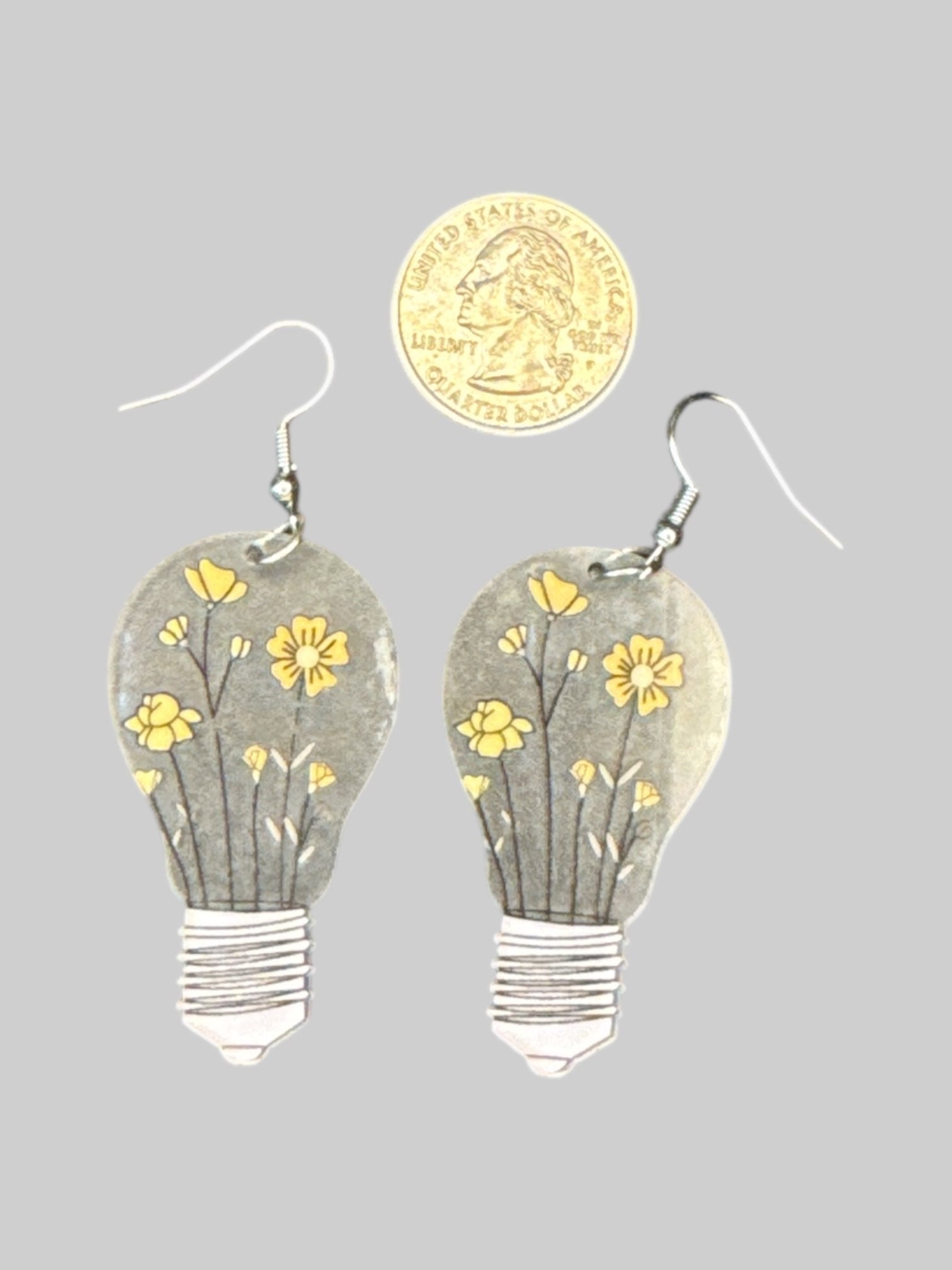 Clear lightbulb earrings with yellow florals