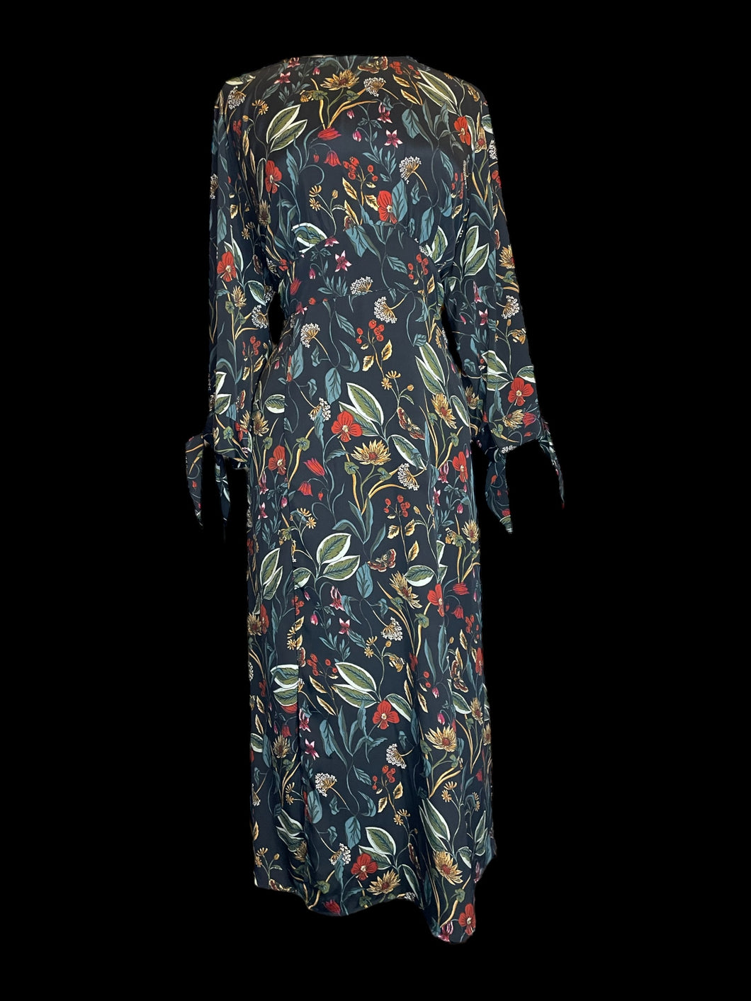 1X Black half sleeve maxi dress w/ botanical pattern, tie cuffs, waist band, & zipper/keyhole/button back closure