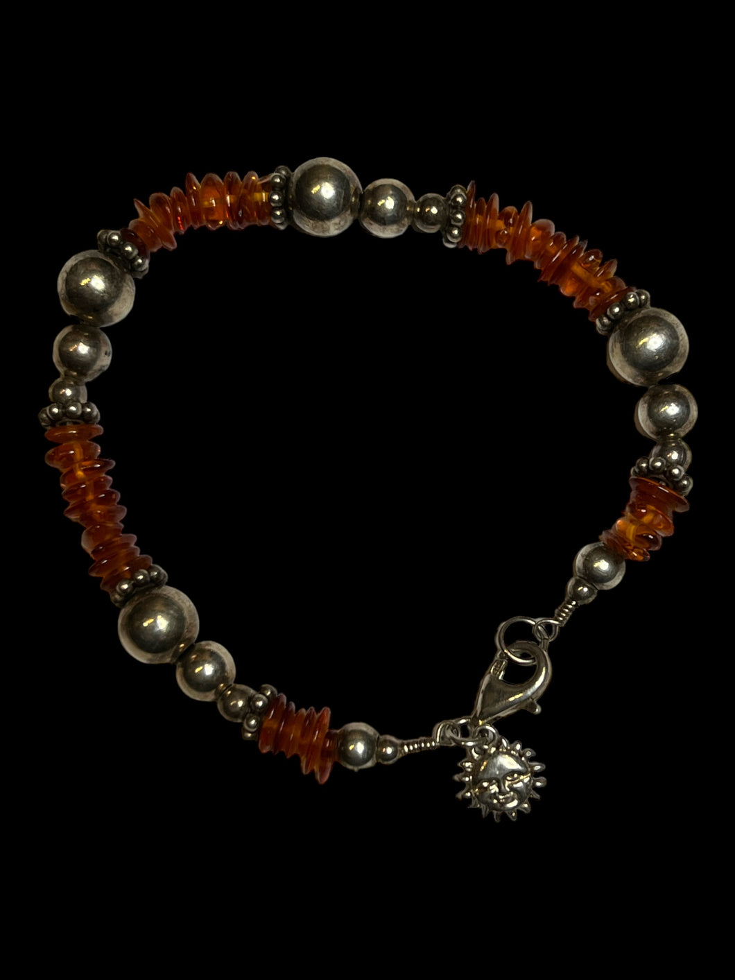 Orange & sterling silver beaded bracelet w/ sun charm, & lobster clasp