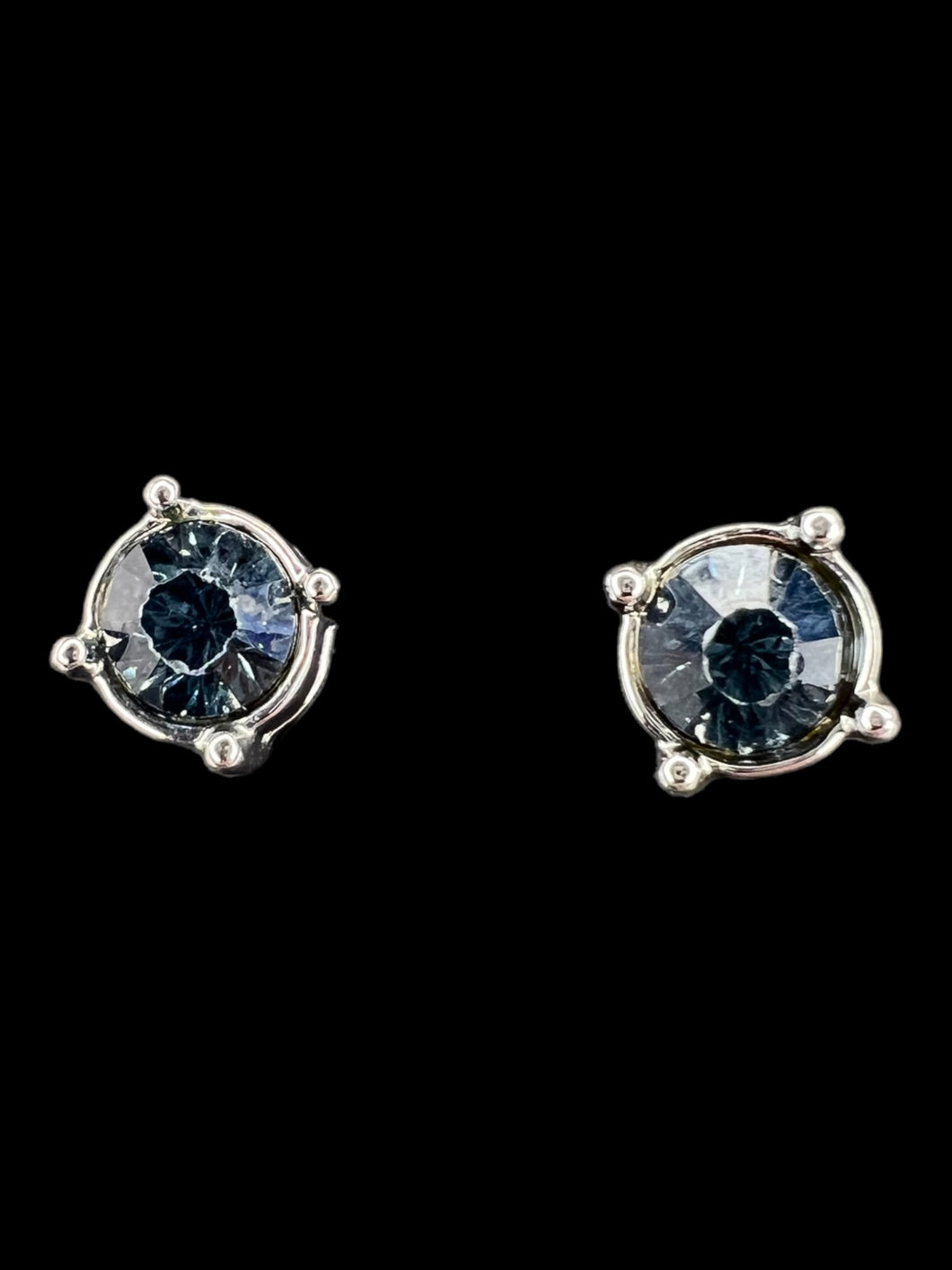 Silver-like framed blue stone stud earrings