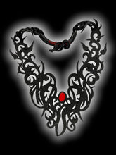 Load image into Gallery viewer, Black latex ornate pattern red stone necklace w/ arrow clasp, box, &amp; care instructions
