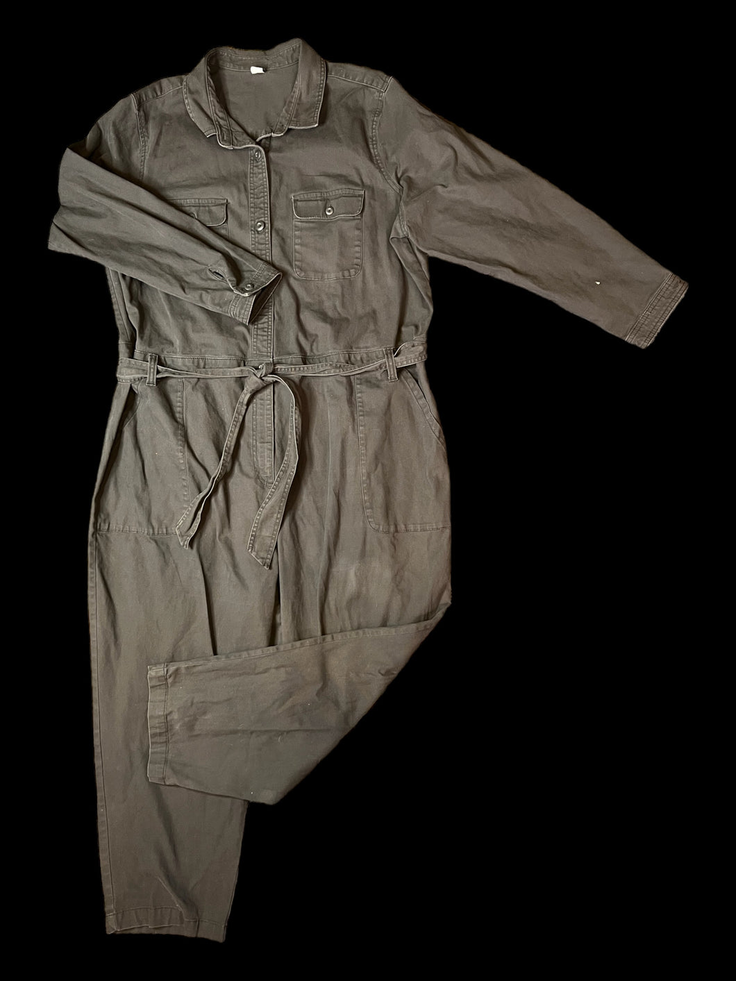 1X Grey denim high rise straight leg partial button-up jumpsuit w/ pockets, belt loops, denim waist tie, button cuffs, & zipper/button closure