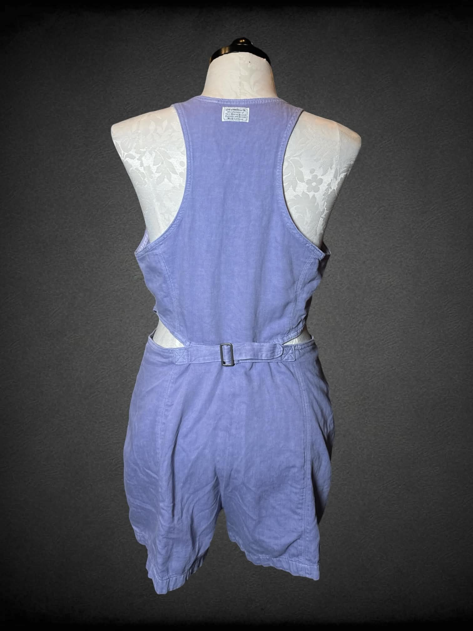 XL Levi’s NWT pastel purple jumpsuit with cutout on sides and zipper on front