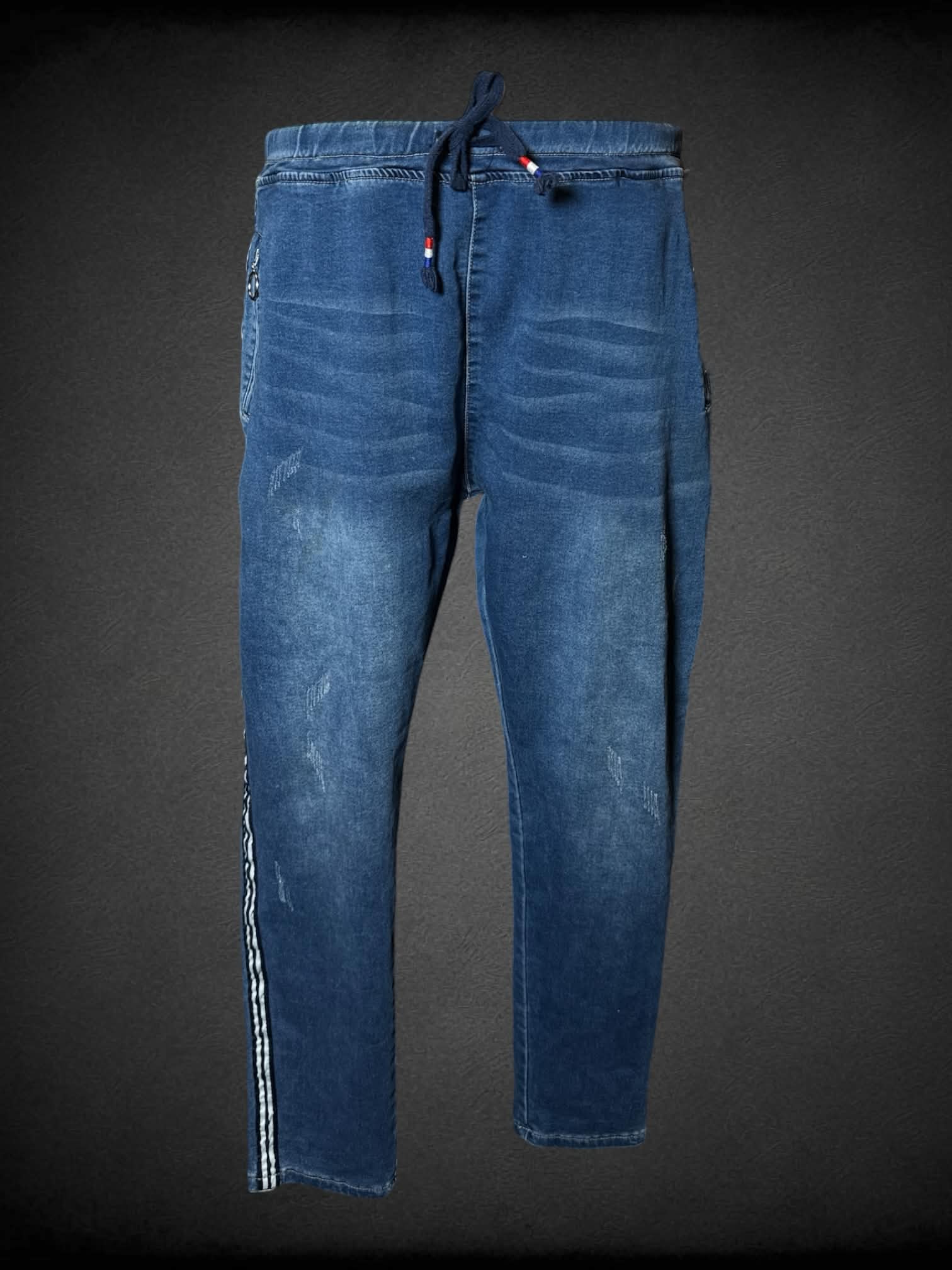 2X Zim & Zoe blue distressed jeans with striped design on each side, zipper pockets and adjustable tie waist