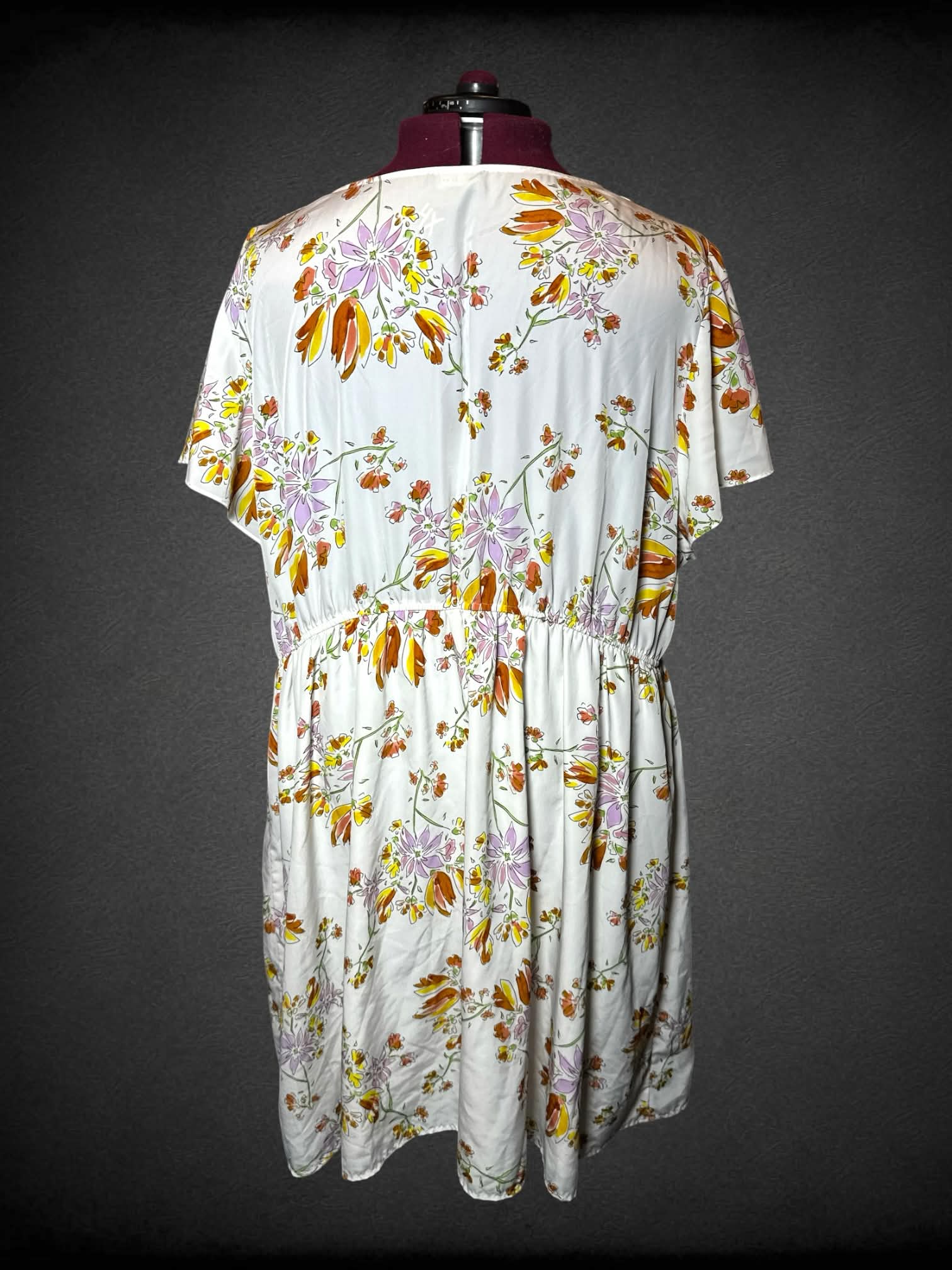4X Ryan Wythe white sheer dress with colorful floral pattern, and cutout on chest