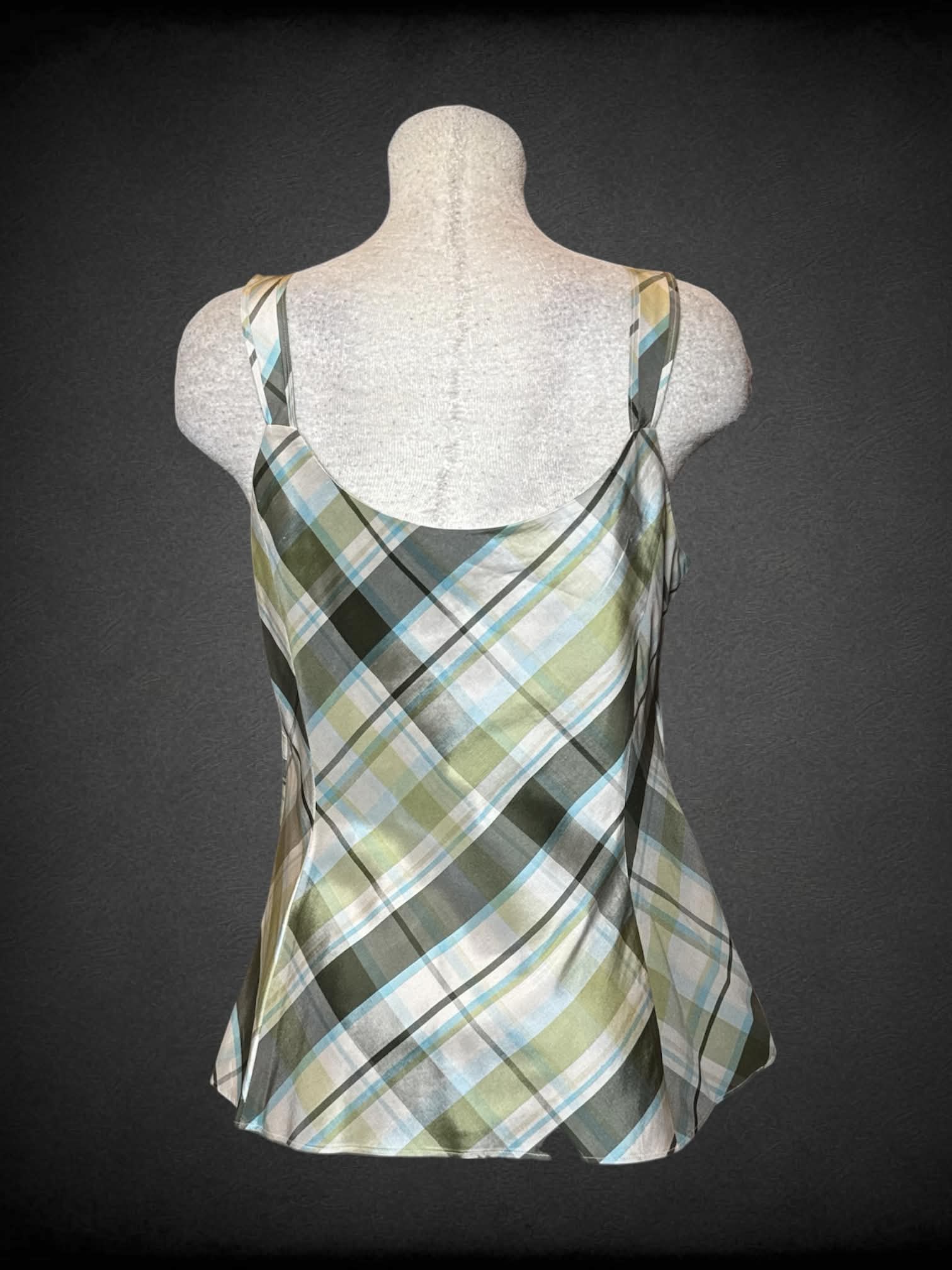 L Ann Taylor green silk plaid blouse with asymmetrical cut on front, and hidden zipper on side