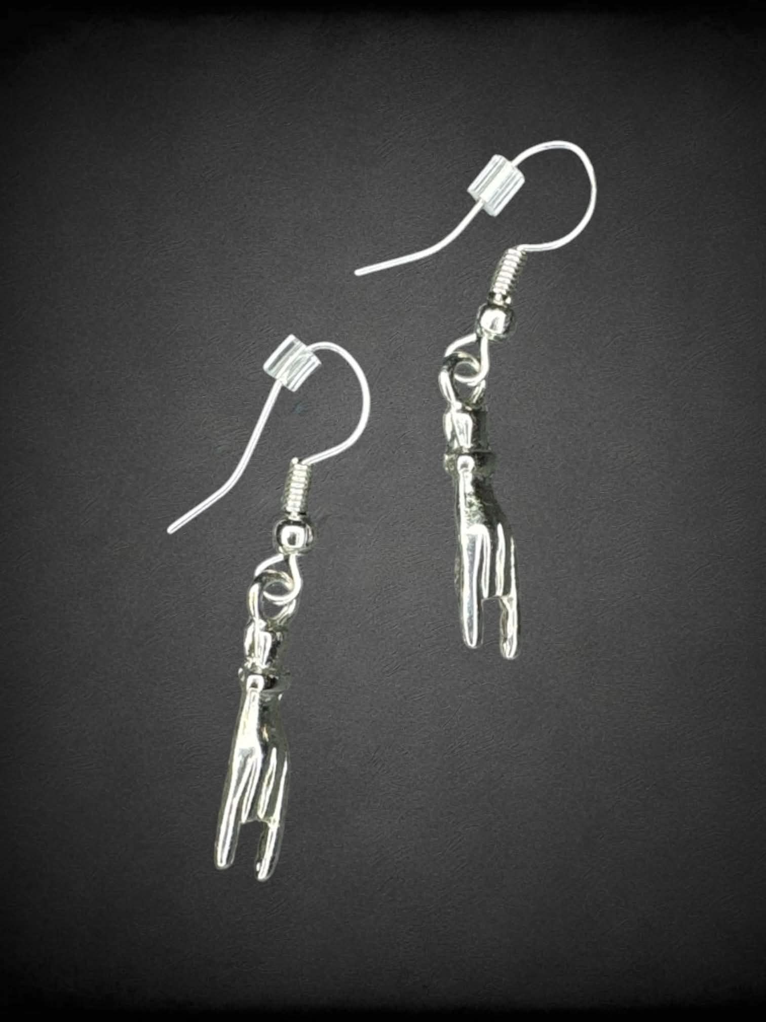 Silver earrings with “Rock On” charm