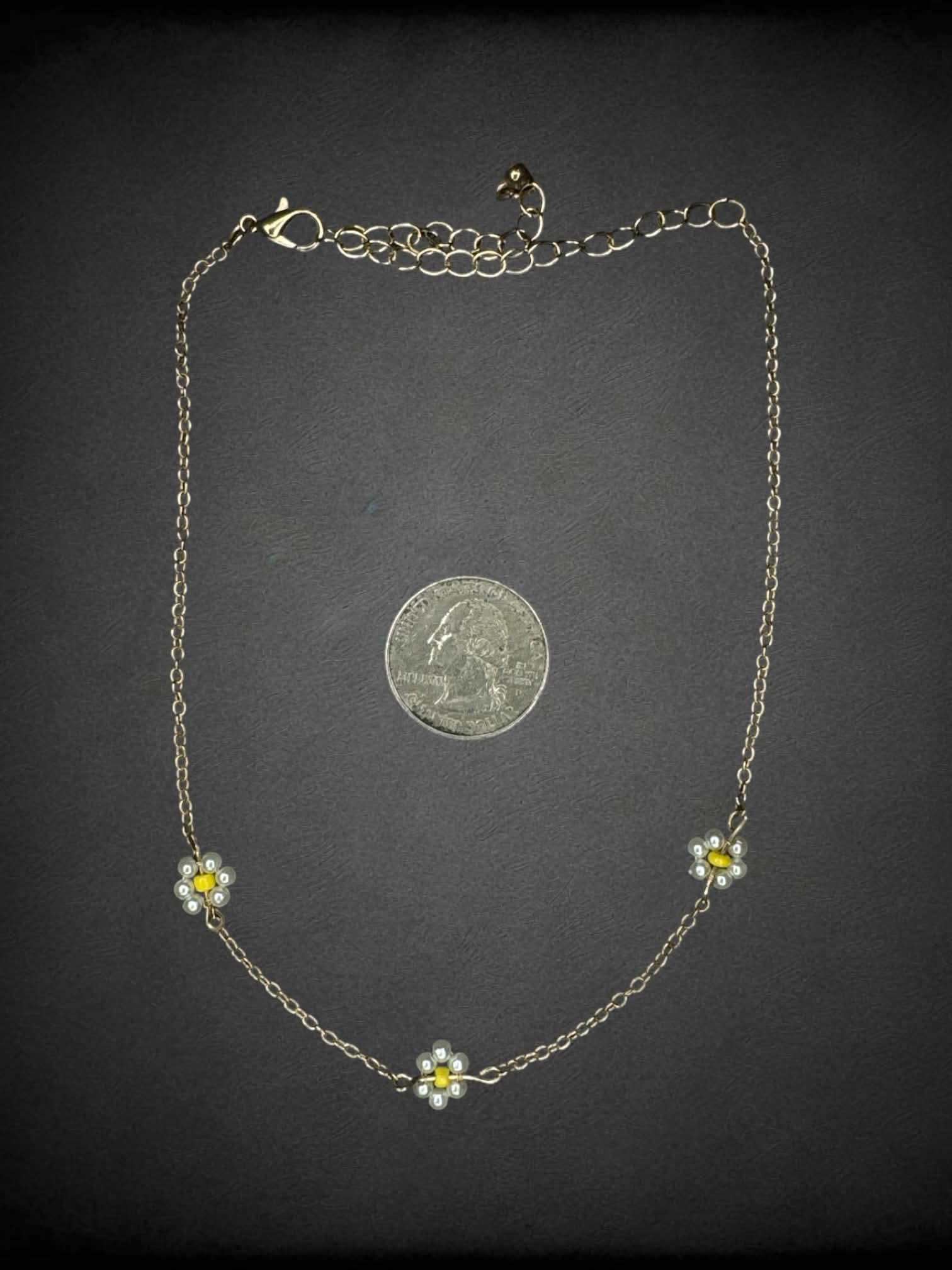 Gold chain choker with beaded daisy charms