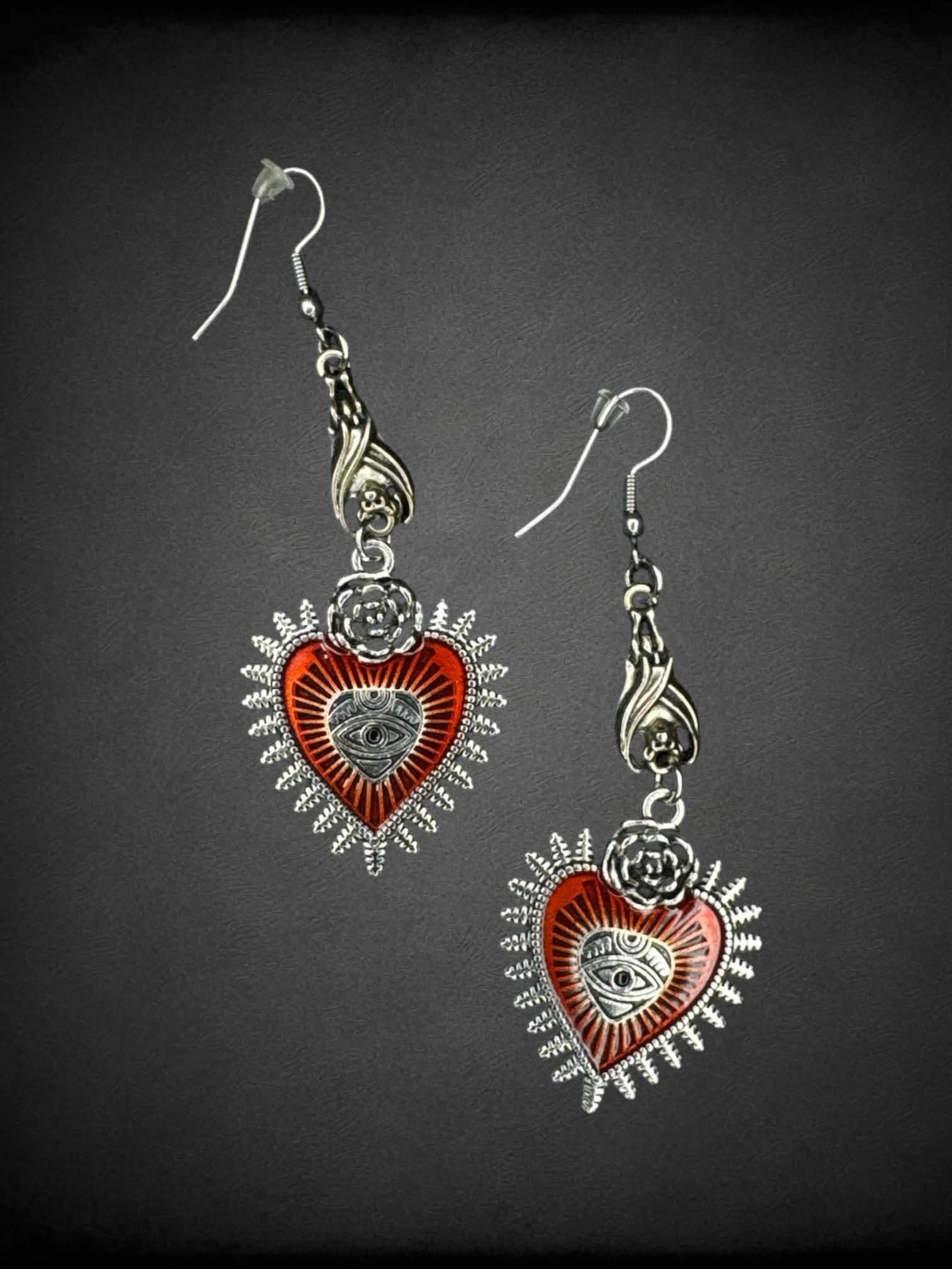 Silver bat earrings with red heart eye charms