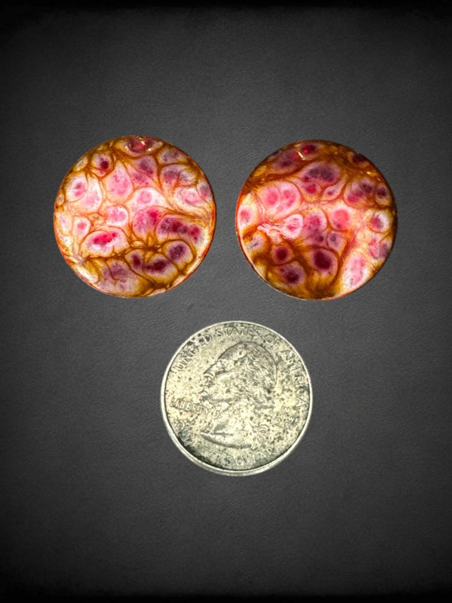 Circular pink & gold clip-on earrings with abstract design