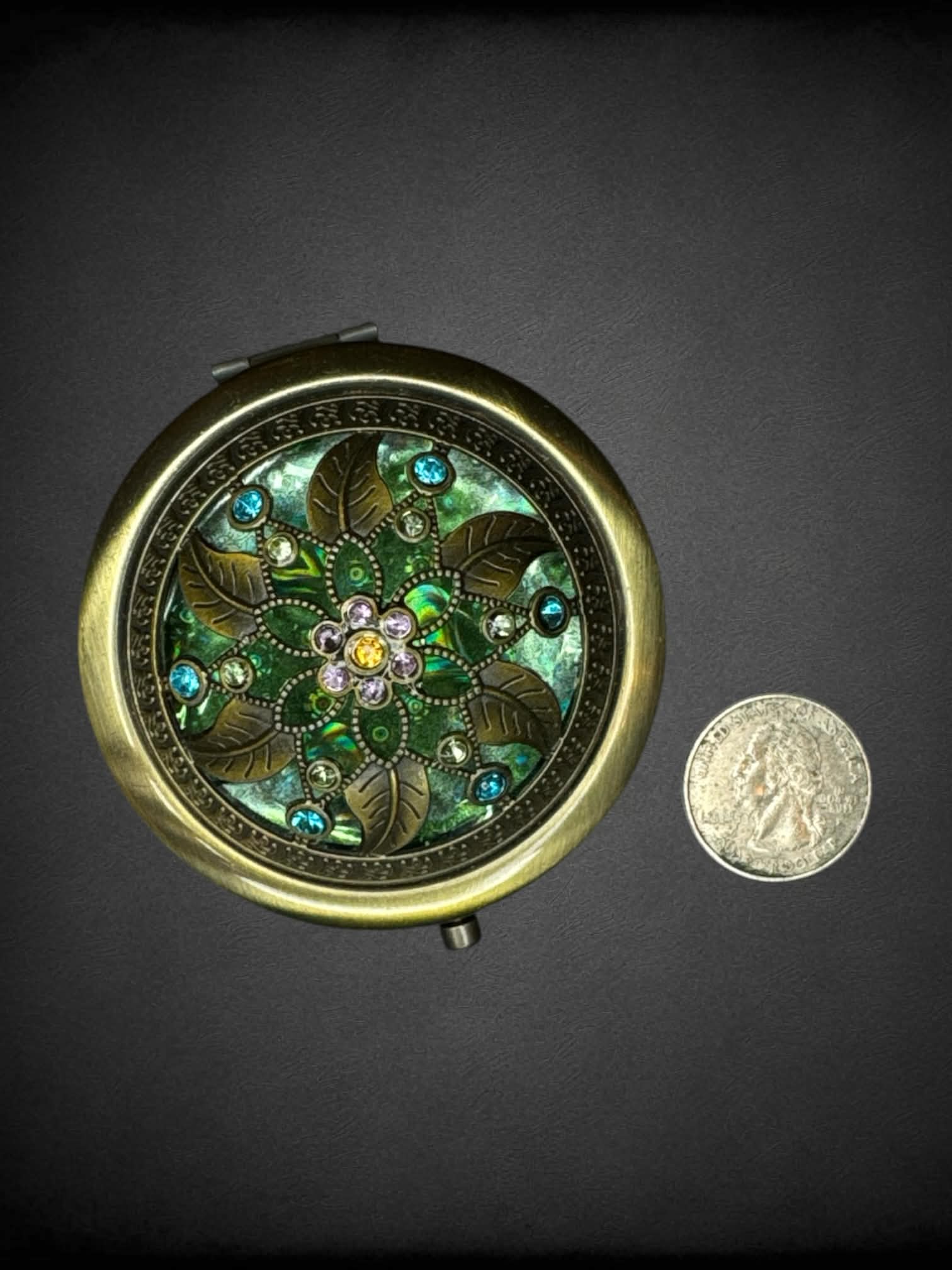 Dome travel mirror with delicate flower design