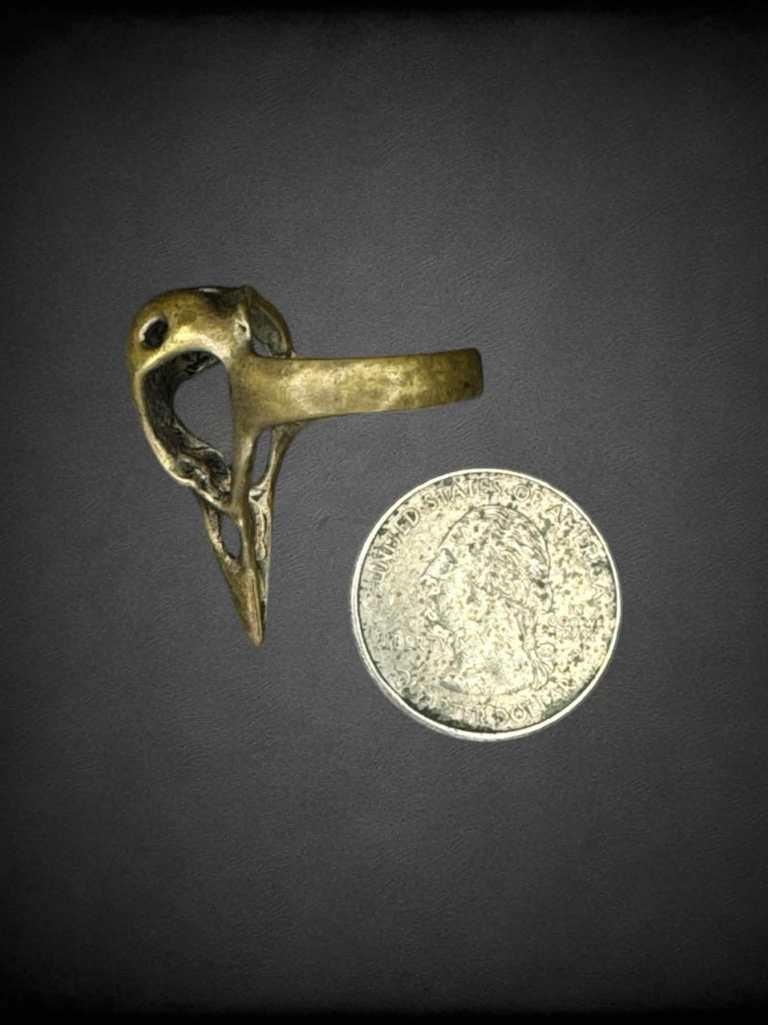 Size 7.5 gold crow skull ring
