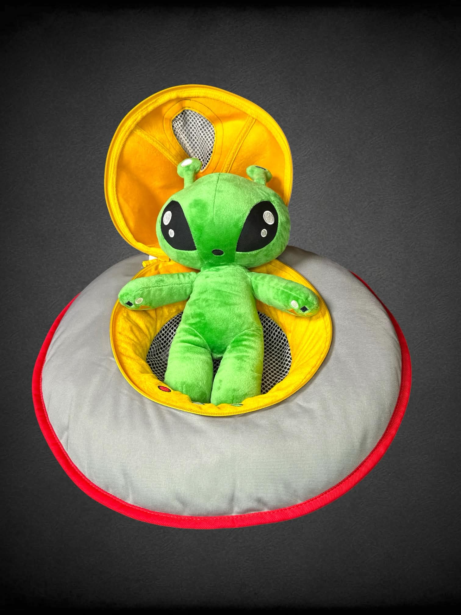 Alien plush with UFO zip-up home