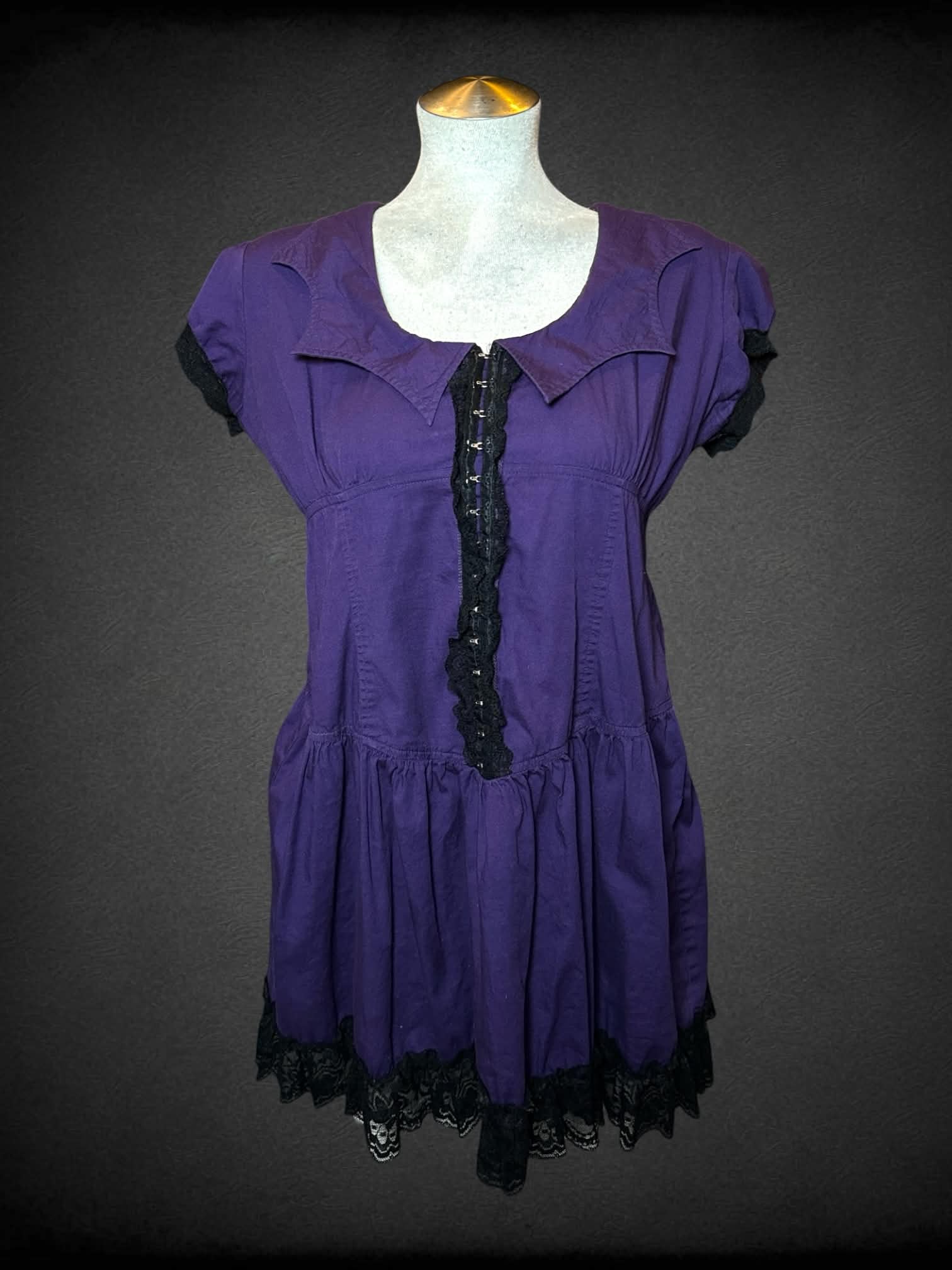 L Lip Service purple dress with bat wing collar, lace hem and hook clasps on front