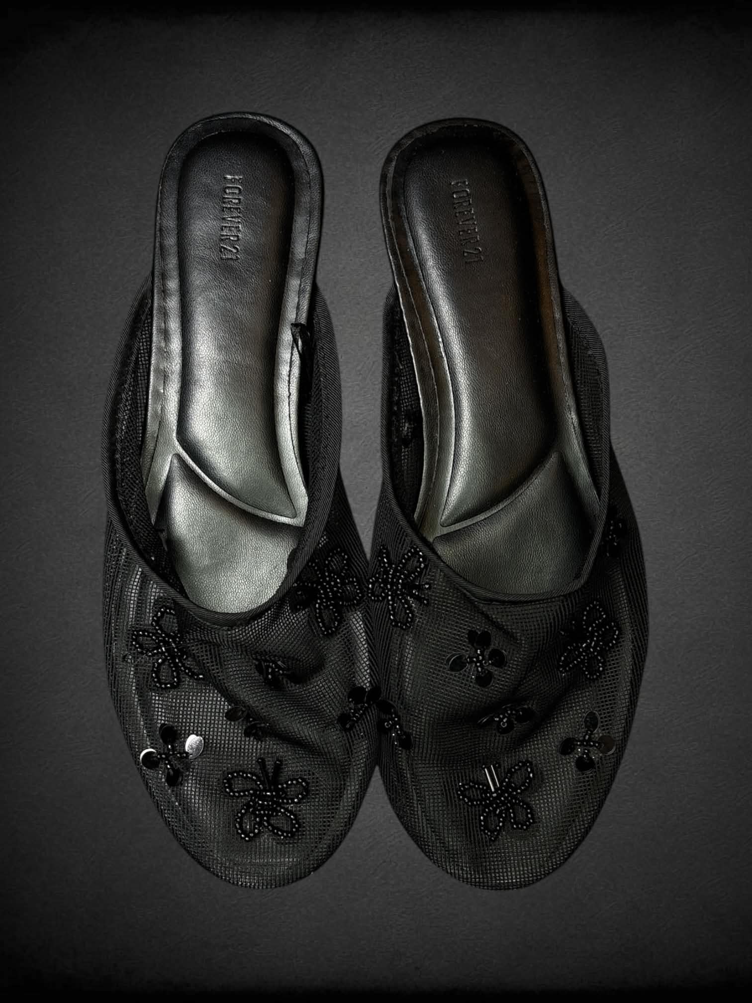 Size 10 Forever 21 black flats with mesh top and beaded flower design