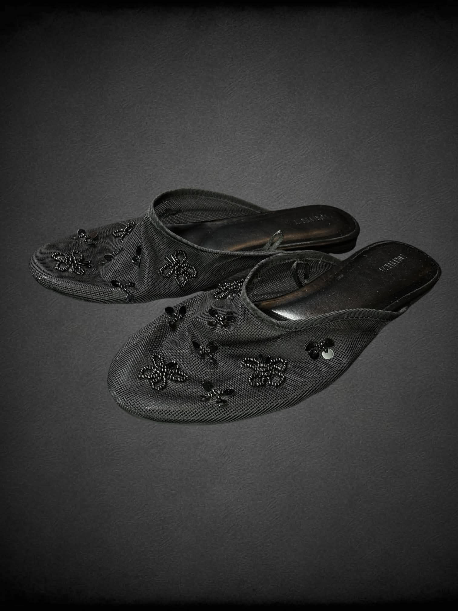 Size 10 Forever 21 black flats with mesh top and beaded flower design