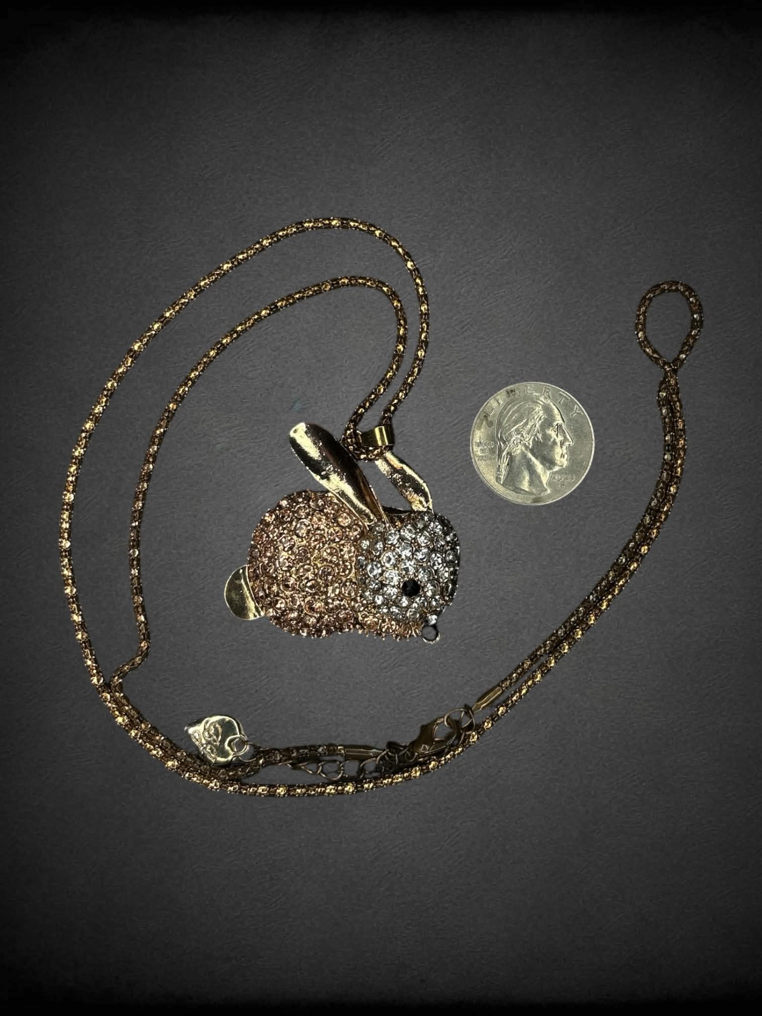 Gold chain necklace with gemstone bunny charm