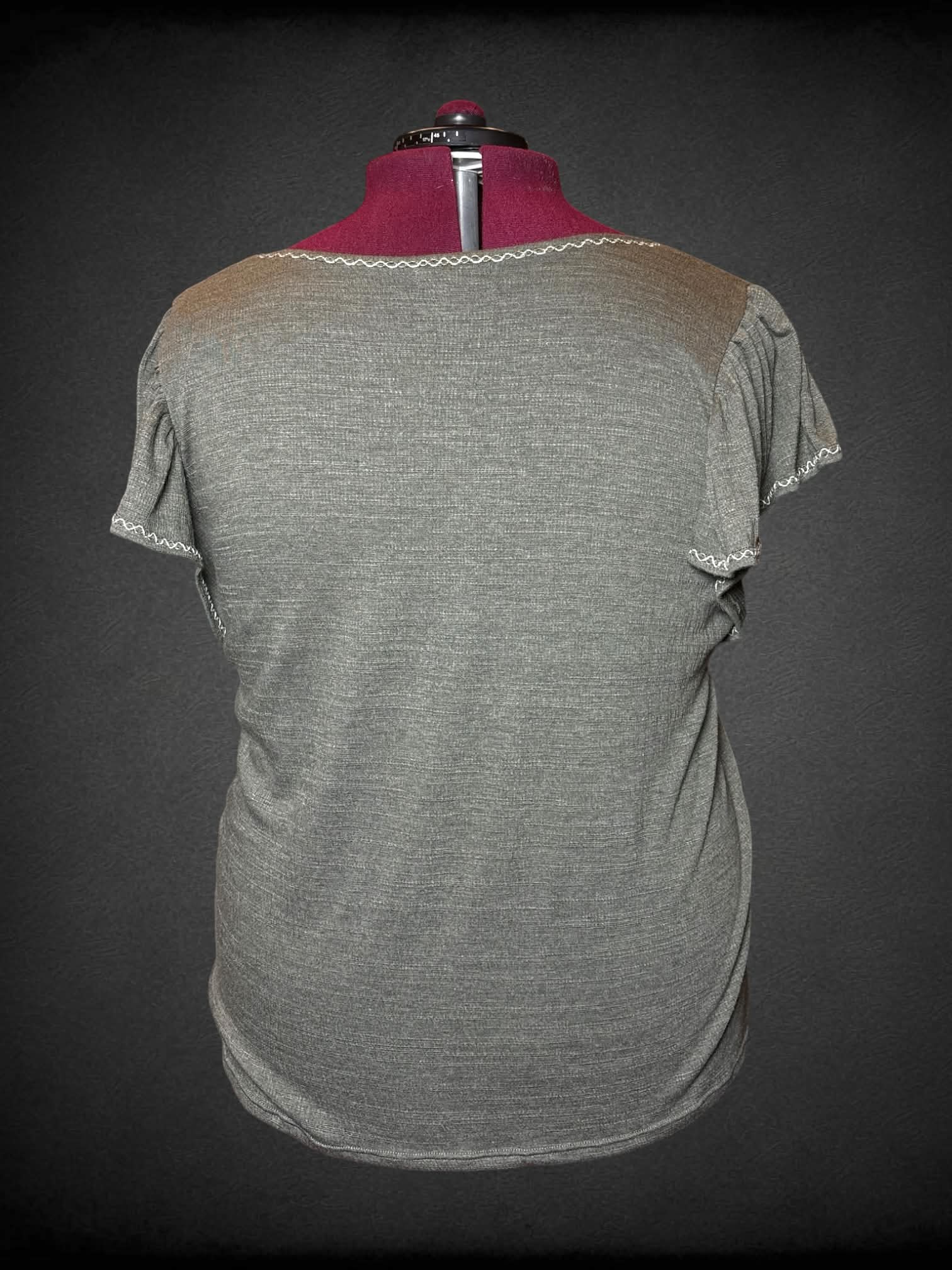3X Max Studio soft green shirt with embroidery detailing on neck line, and ruffle sleeves