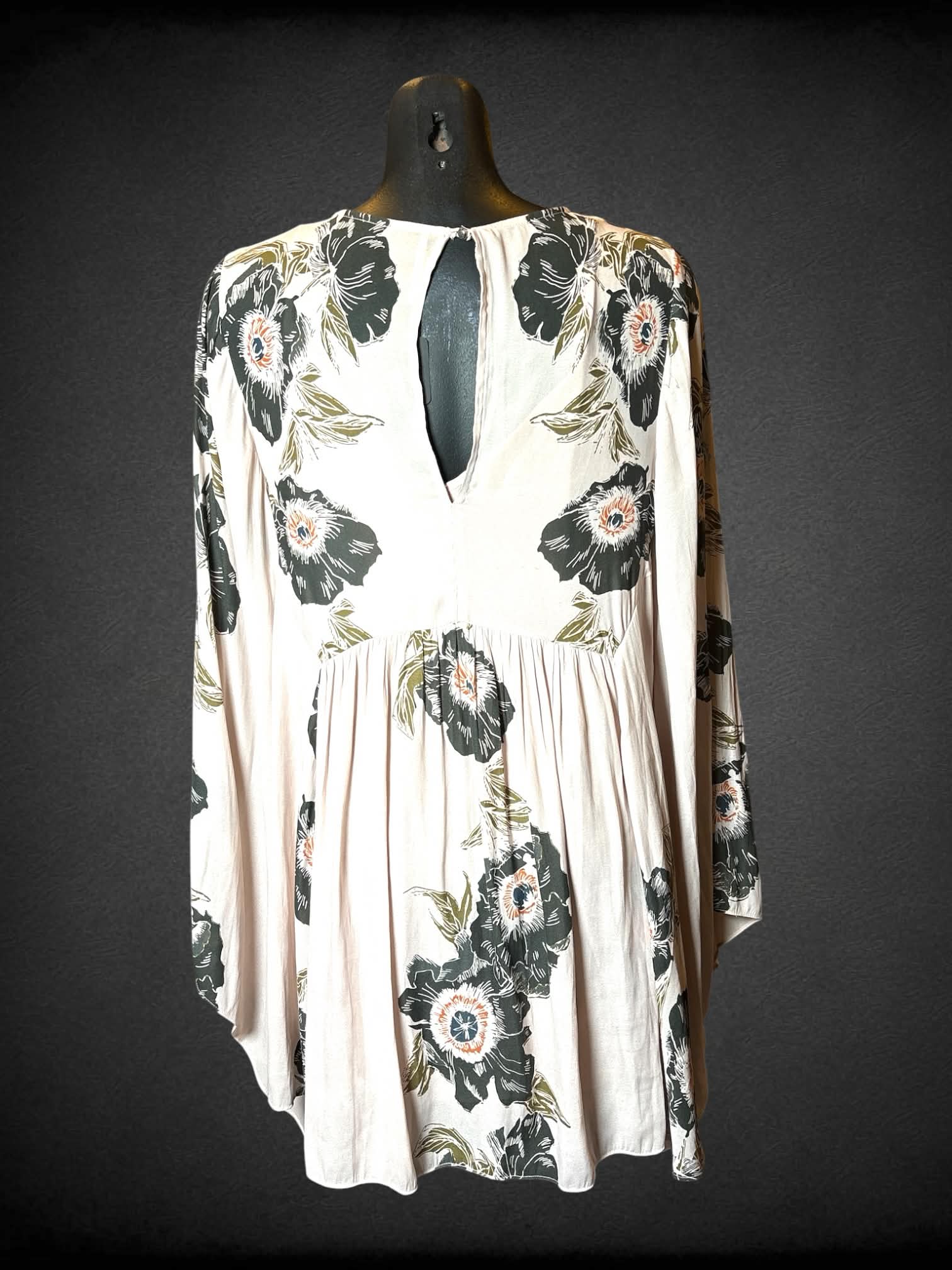 M Free People pink layered flowy blouse with floral design, cutout on front and back, and bell sleeves