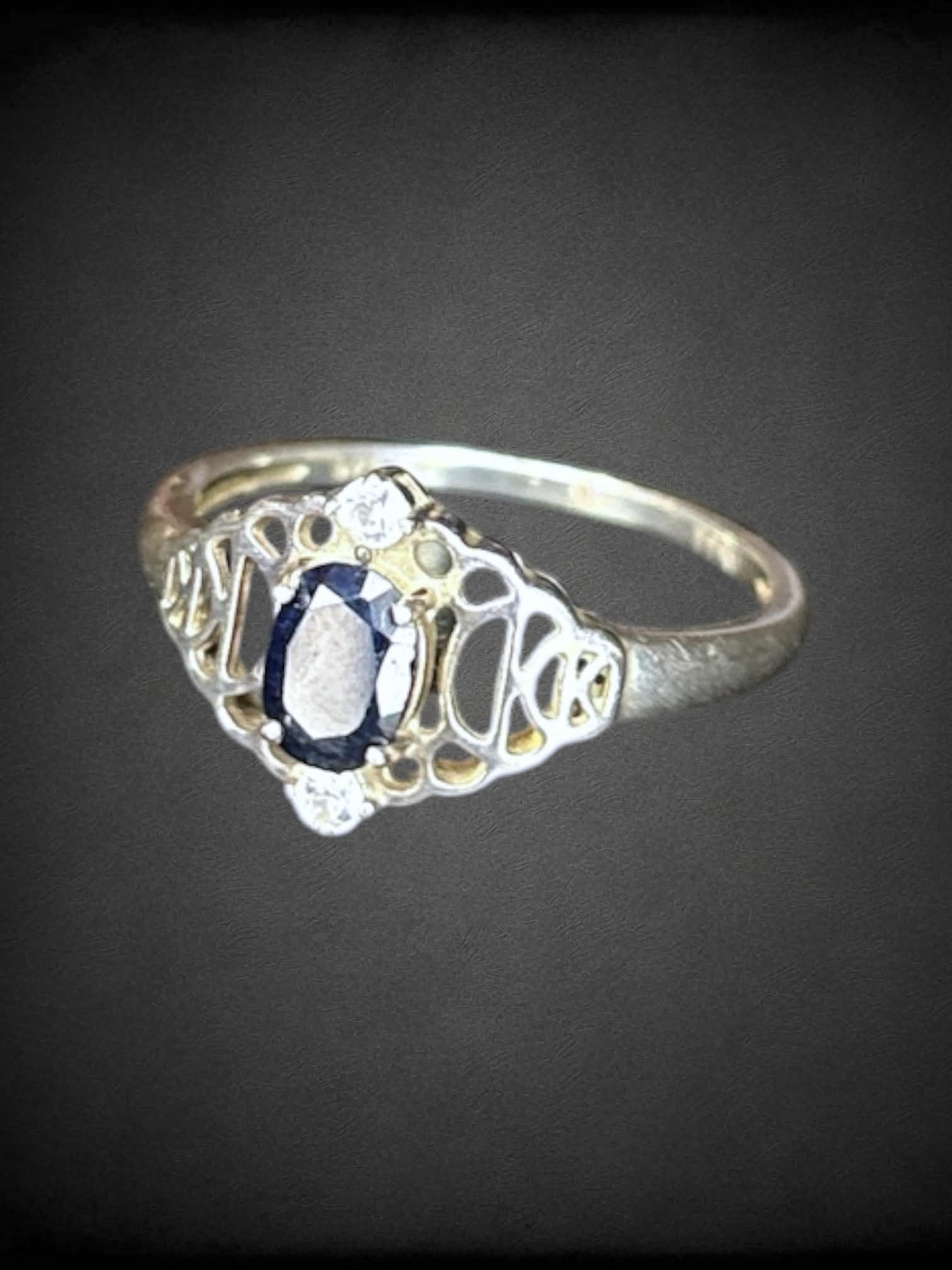 Size 11 silver ring with blue stone