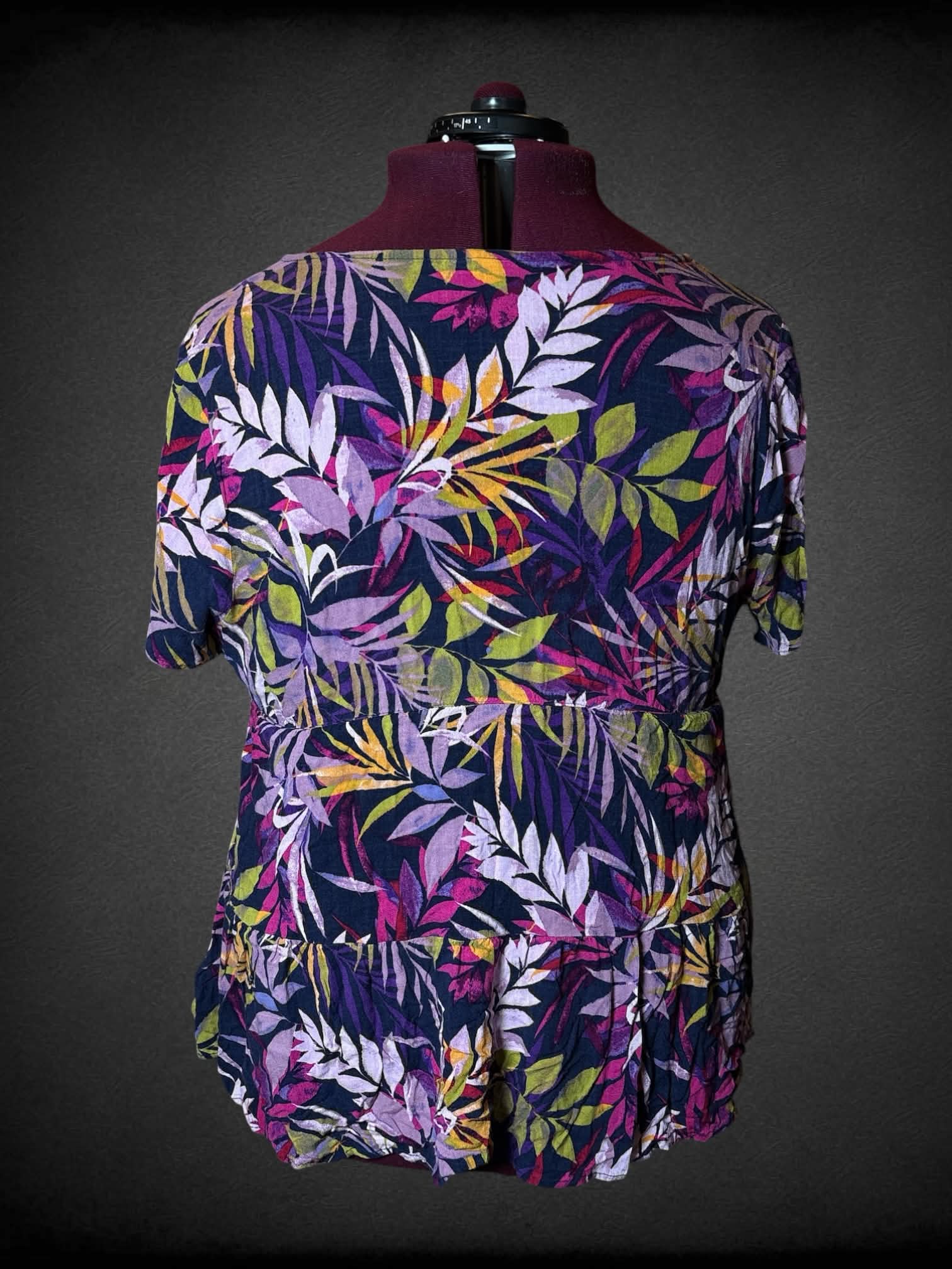 2X Torrid purple blouse with colorful botanical pattern, buttons on front, and empire waist seem