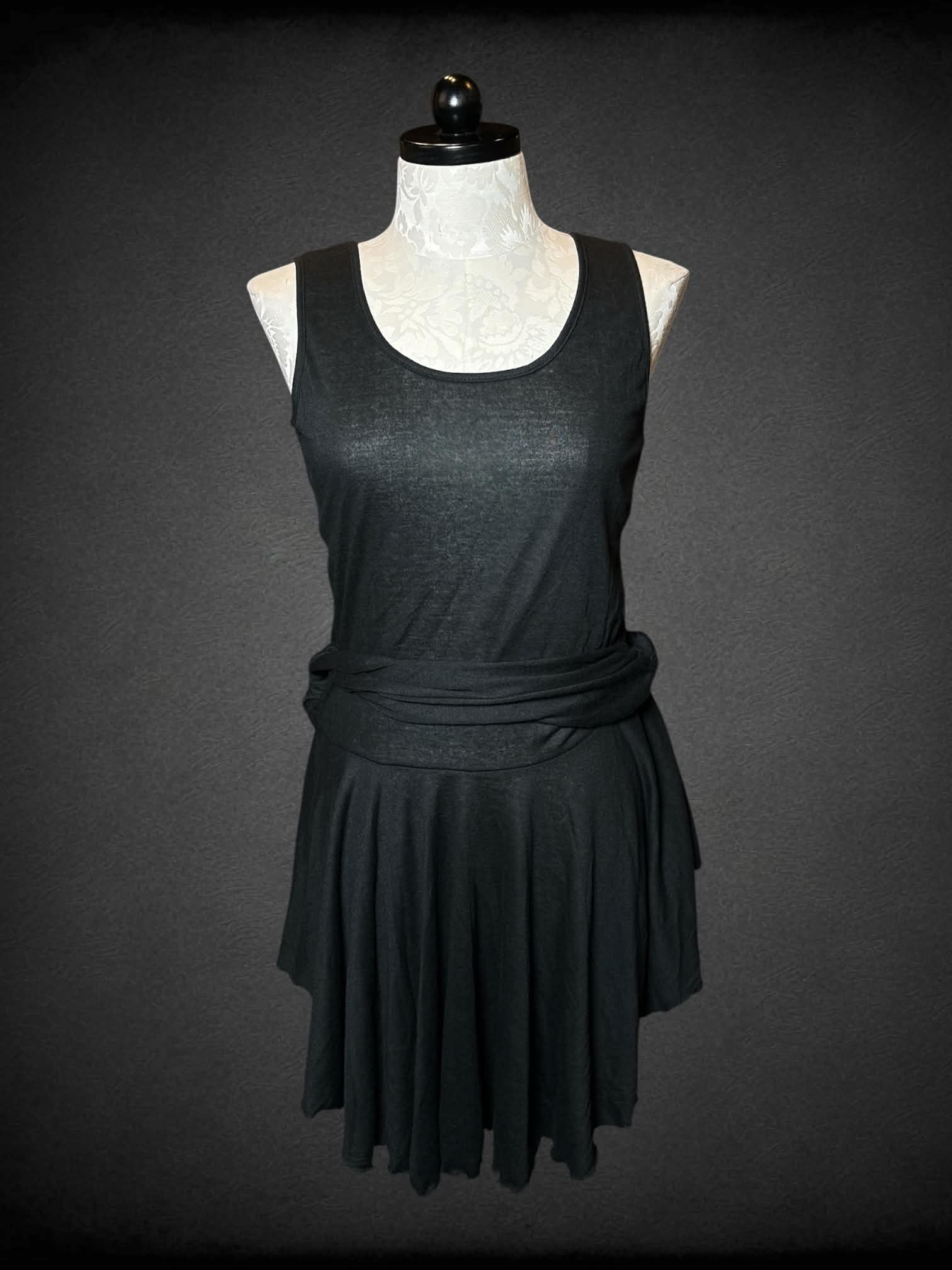 1X International Boutique NWT black dress with wrap around waist, and pleated skirt