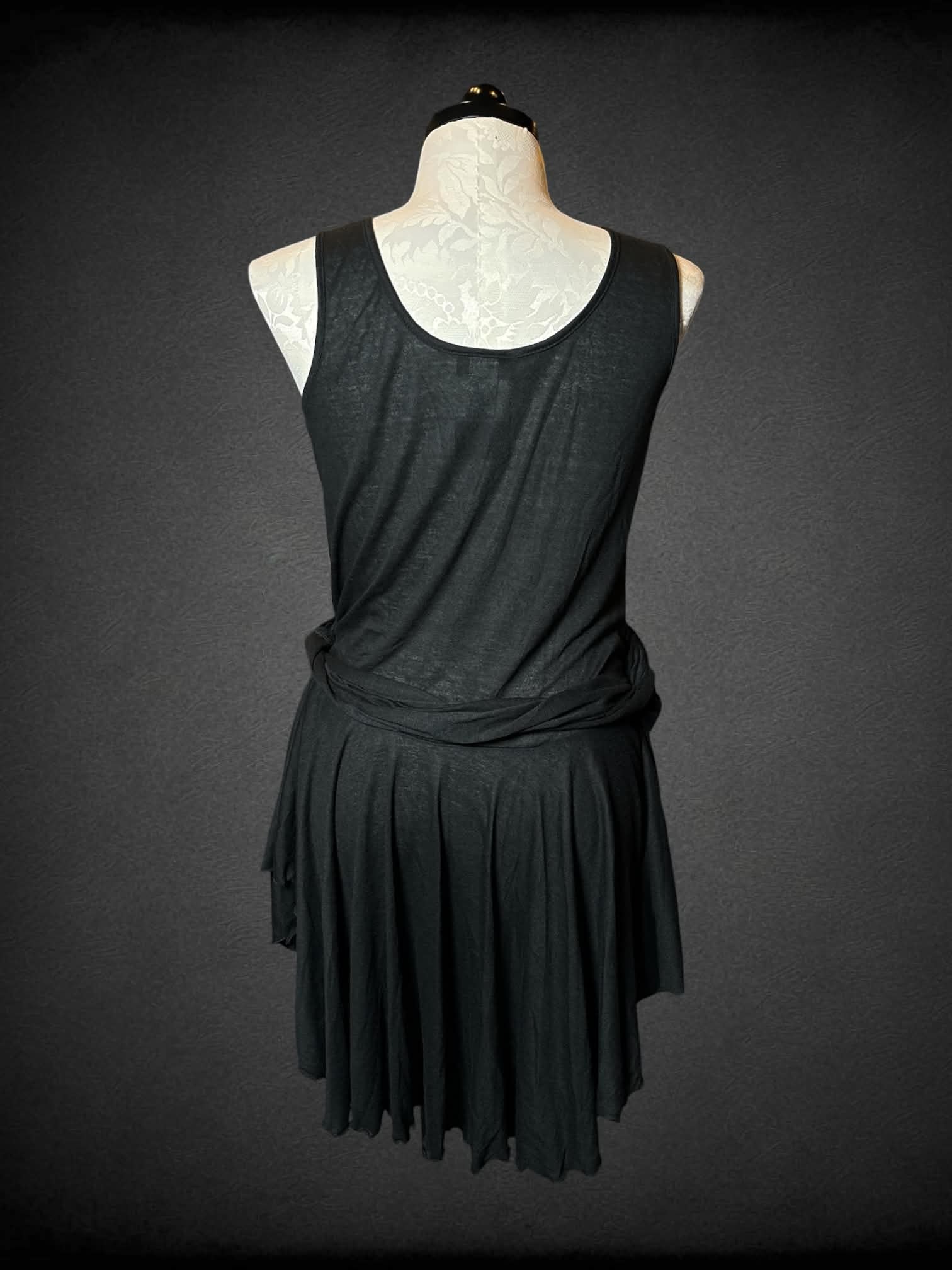 1X International Boutique NWT black dress with wrap around waist, and pleated skirt