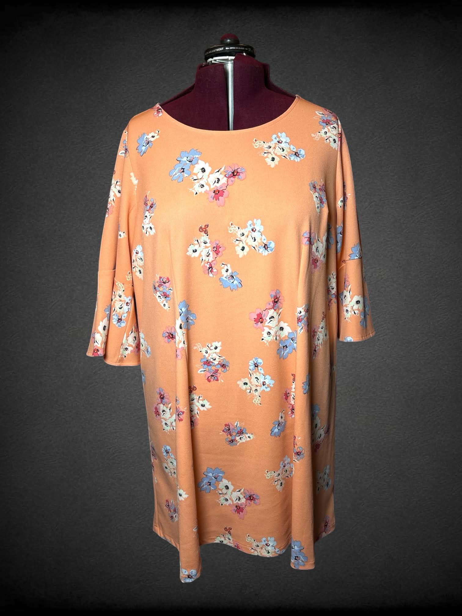 3X Lane Bryant peach dress with bell sleeves, and floral pattern