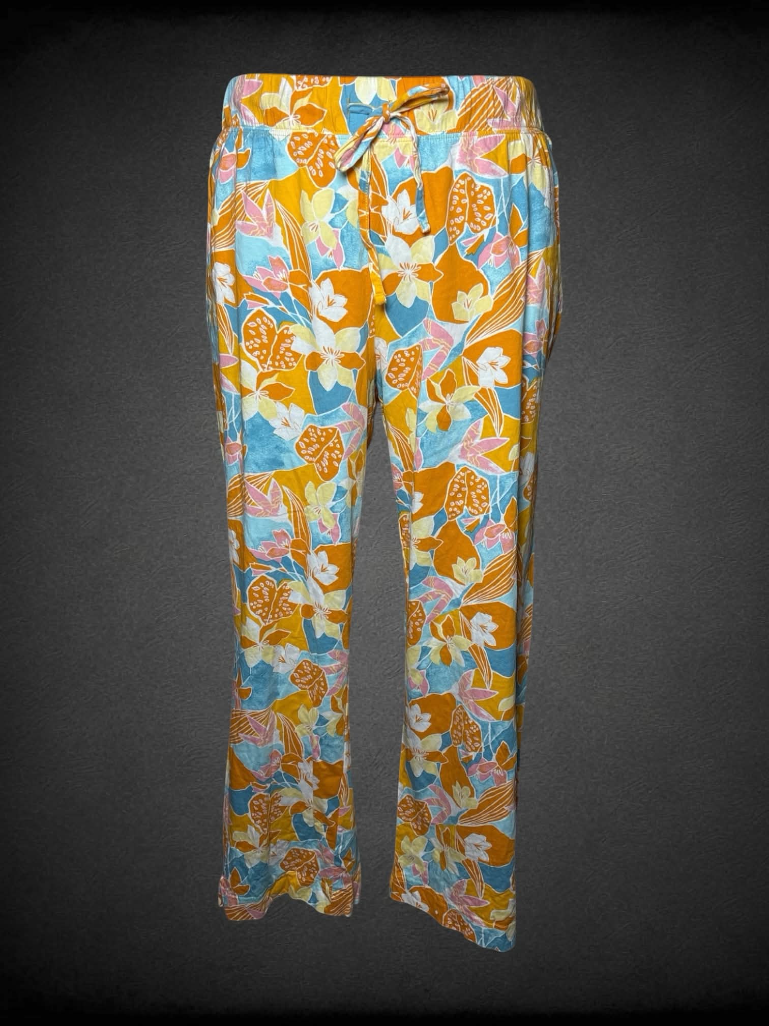 1X Jockey yellow pants with tropical floral pattern, and adjustable tie waist