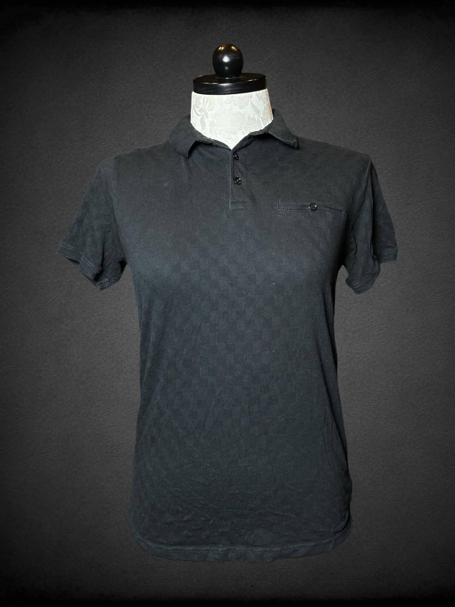 XL Ricky Singh black polo shirt with subtle checkerboard pattern, and faux pocket